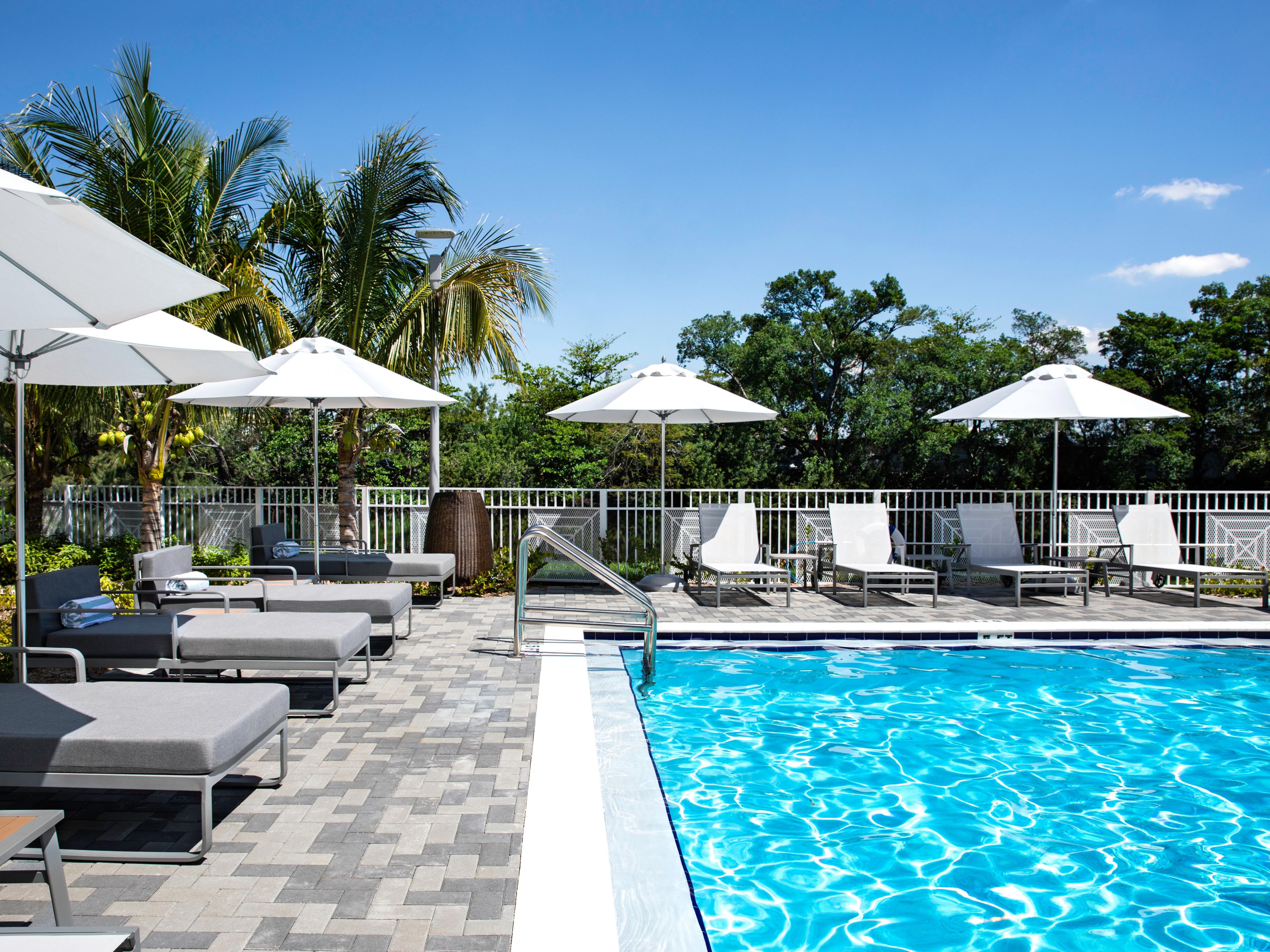 Outdoor swimming pool with plenty of seating