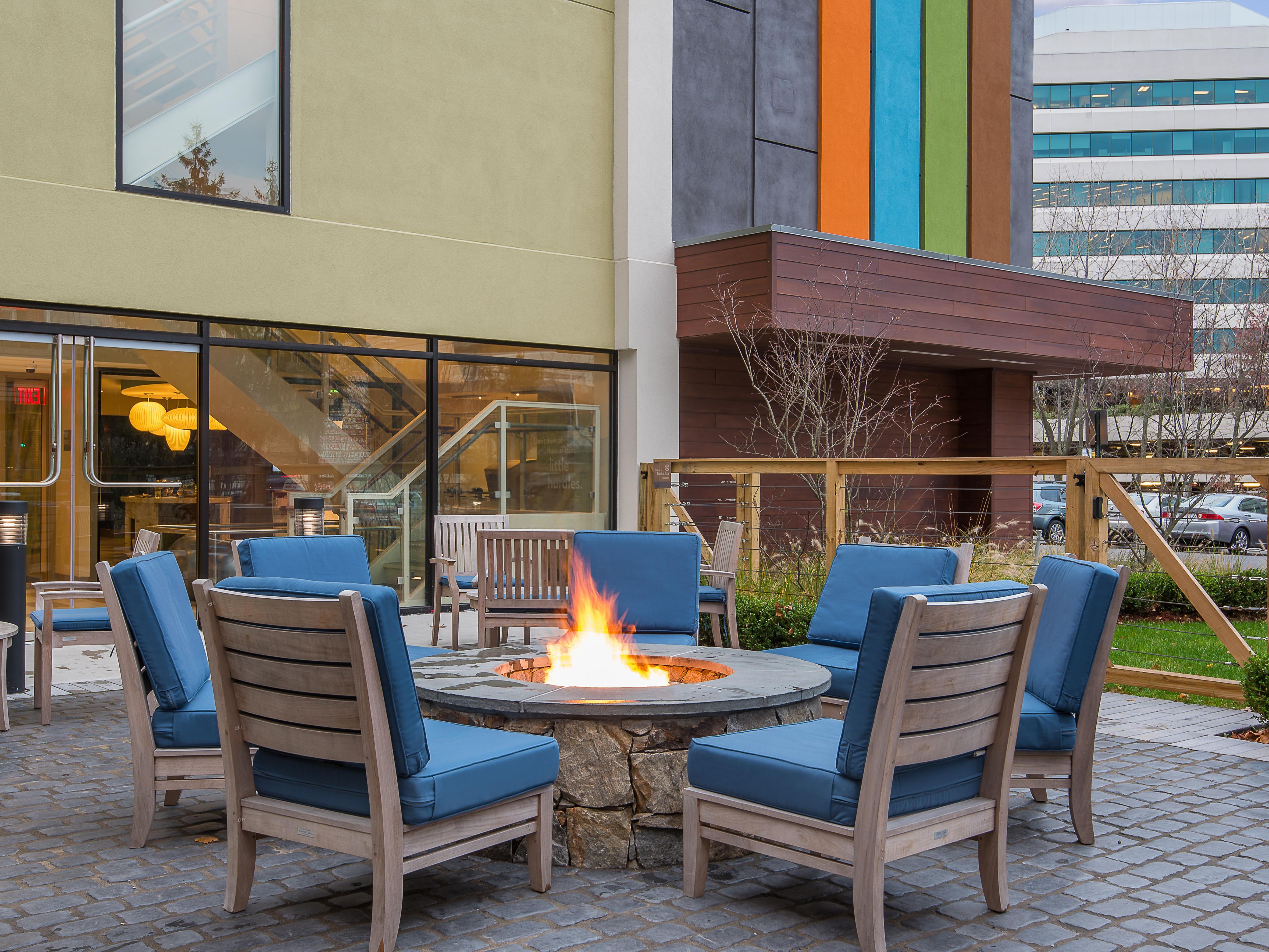 Relax with friends and family by the fire on our patio.