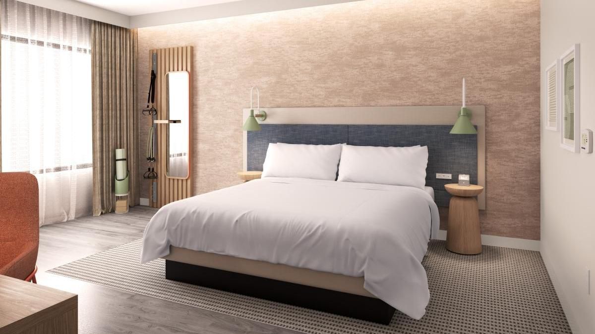 Queen bed in a hotel room