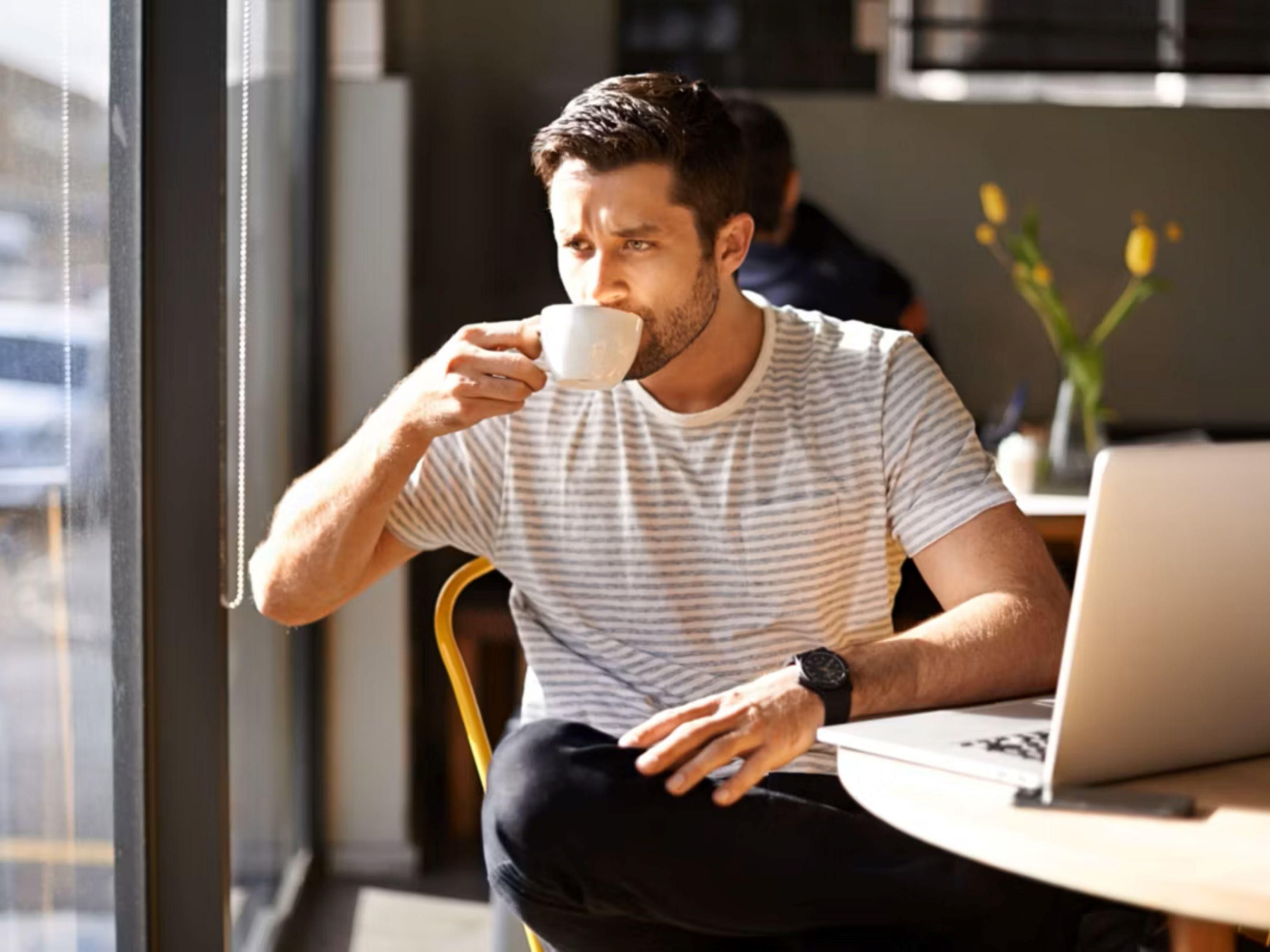 man drinking coffee