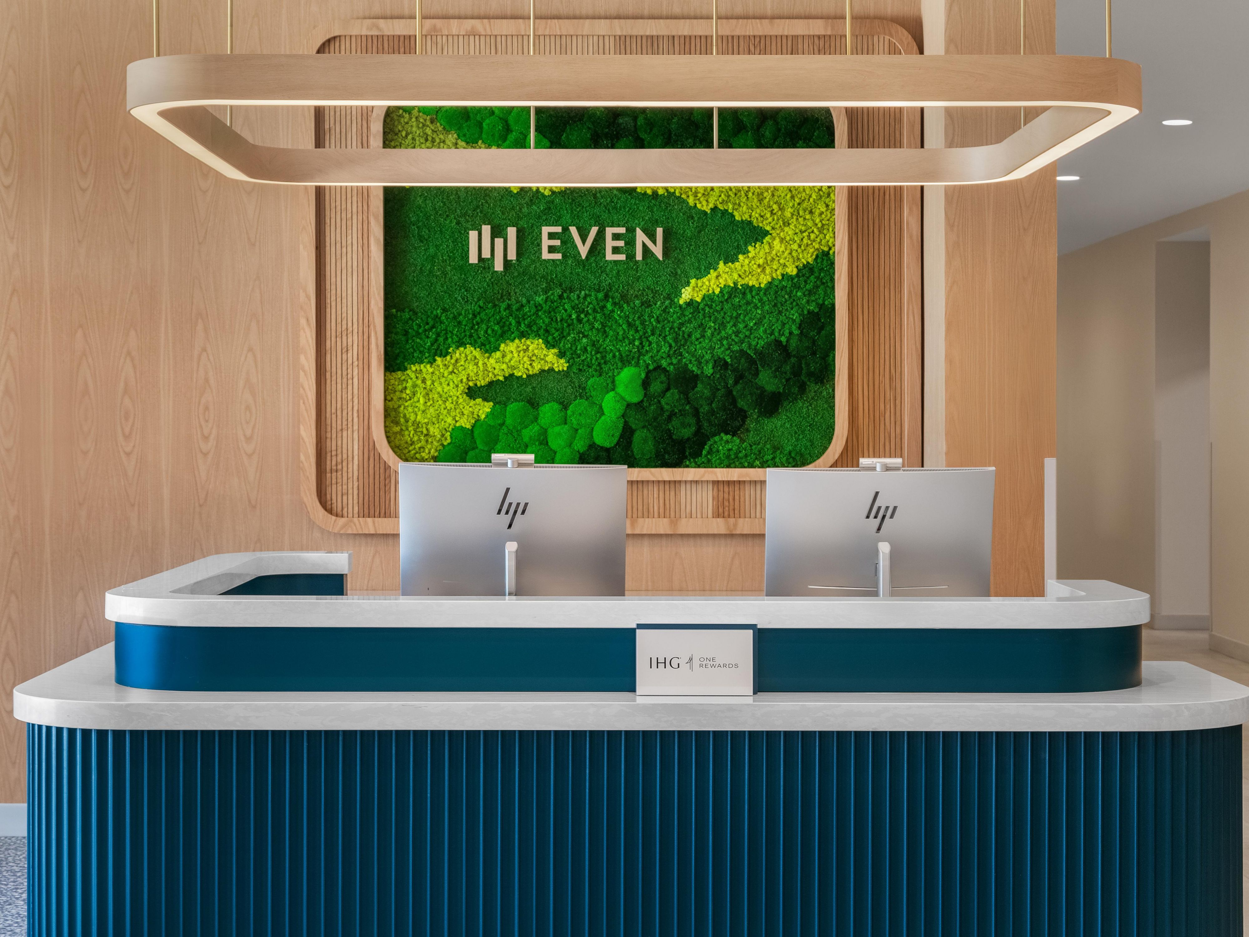 Reception desk at EVEN Hotel Orlando International Airport