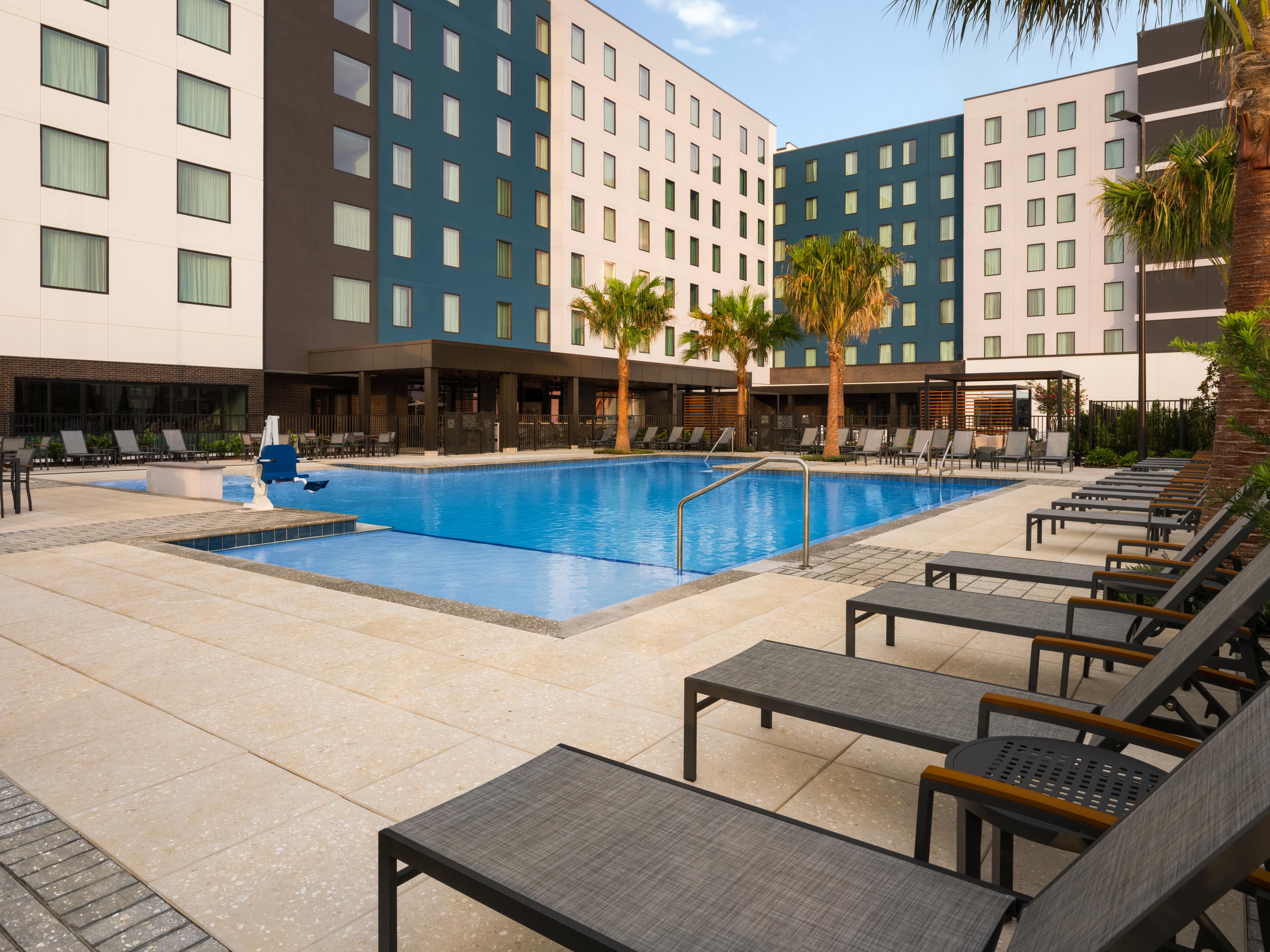Unwind beside our Orlando hotel with a pool and outdoor courtyard.
