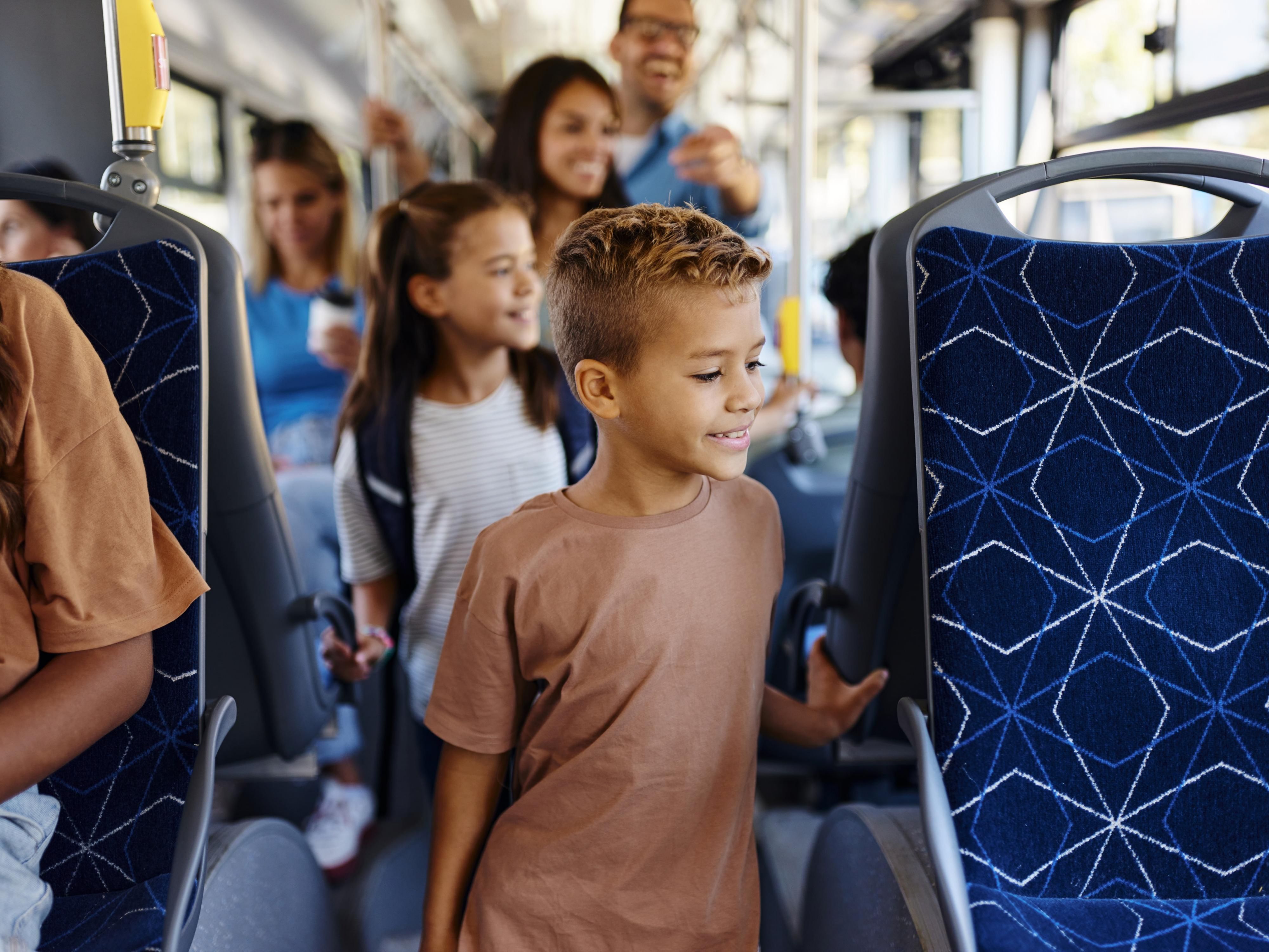 Family riding the complimentary shuttle