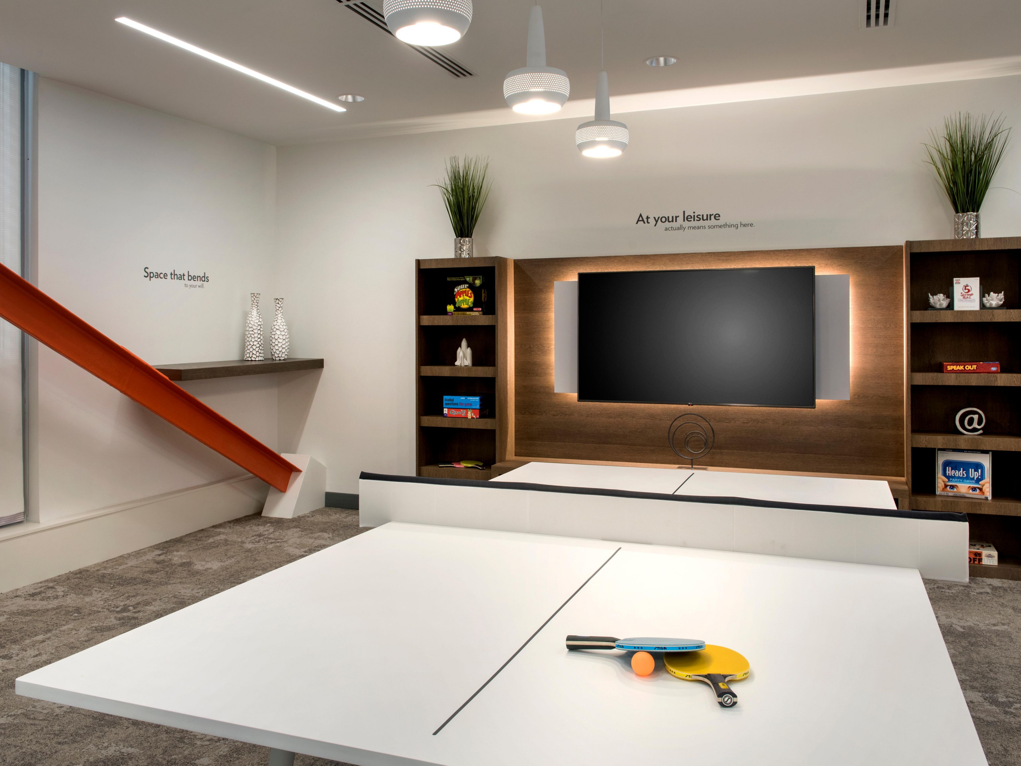 EVEN Hotel Pittsburgh Downtown's game room is the perfect place to unwind after a long day of work or to host a fun event. With a ping pong table and other games, you can relax and have fun with your colleagues or friends. The game room is also available to rent for events, making it a unique and exciting venue for your next gathering.

