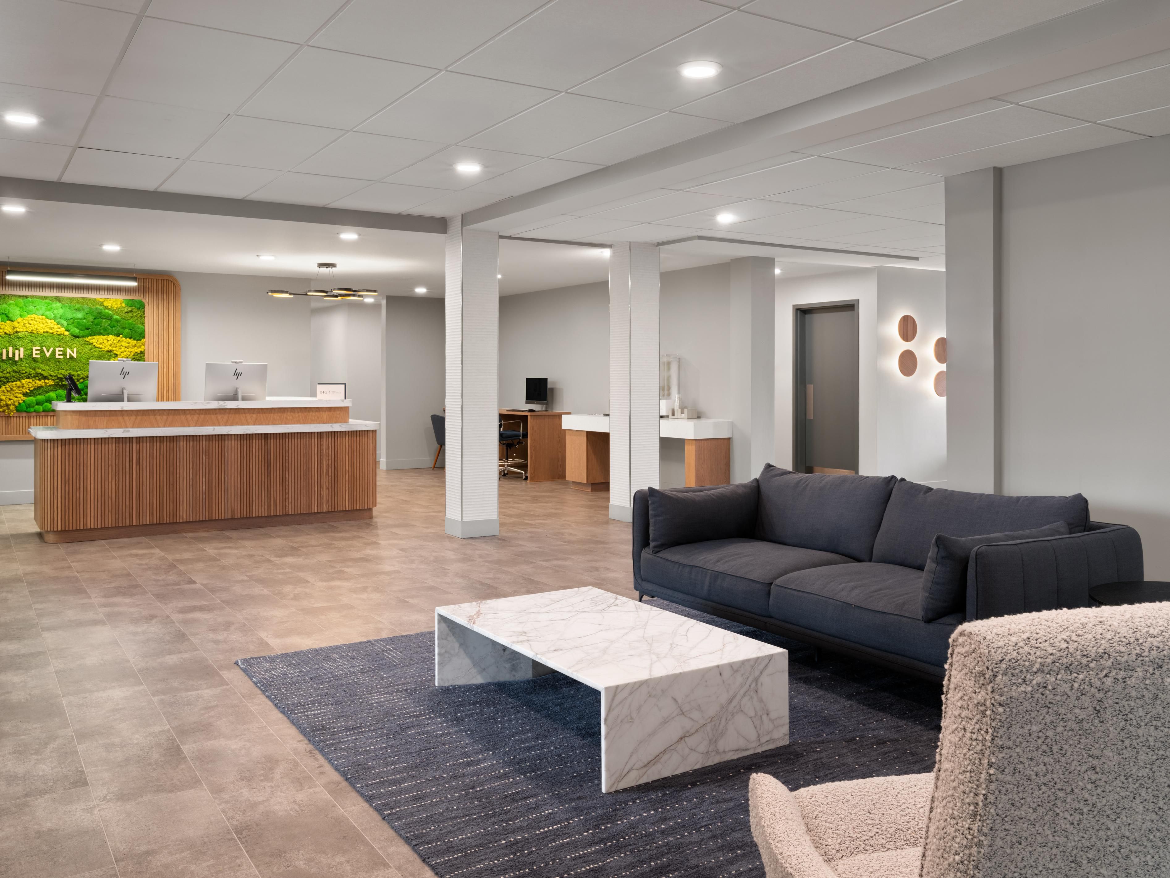 Unwind in cozy lobby seating at EVEN Hotel Portland - Beaverton