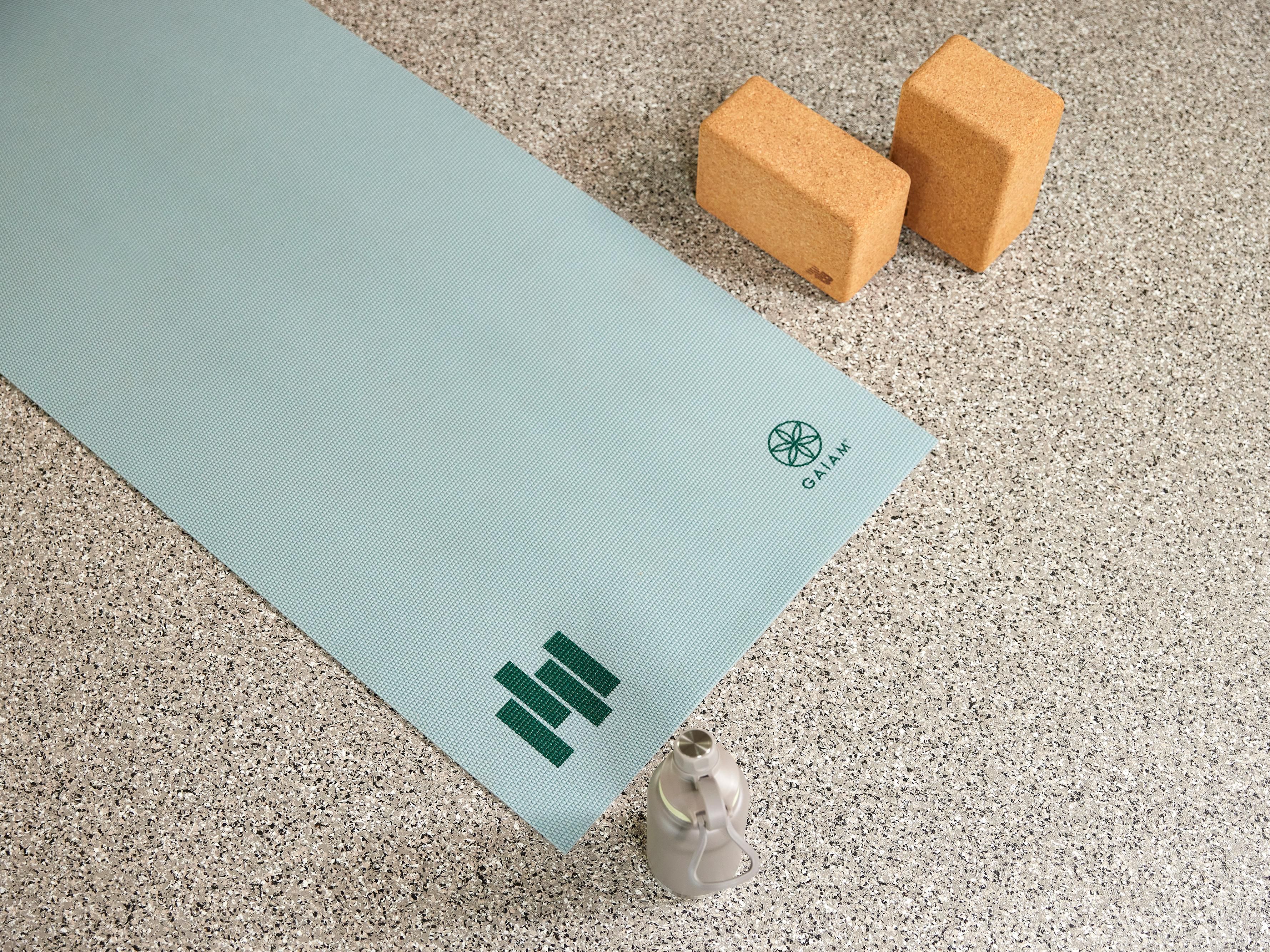 Yoga mat and yoga blocks with a water bottle