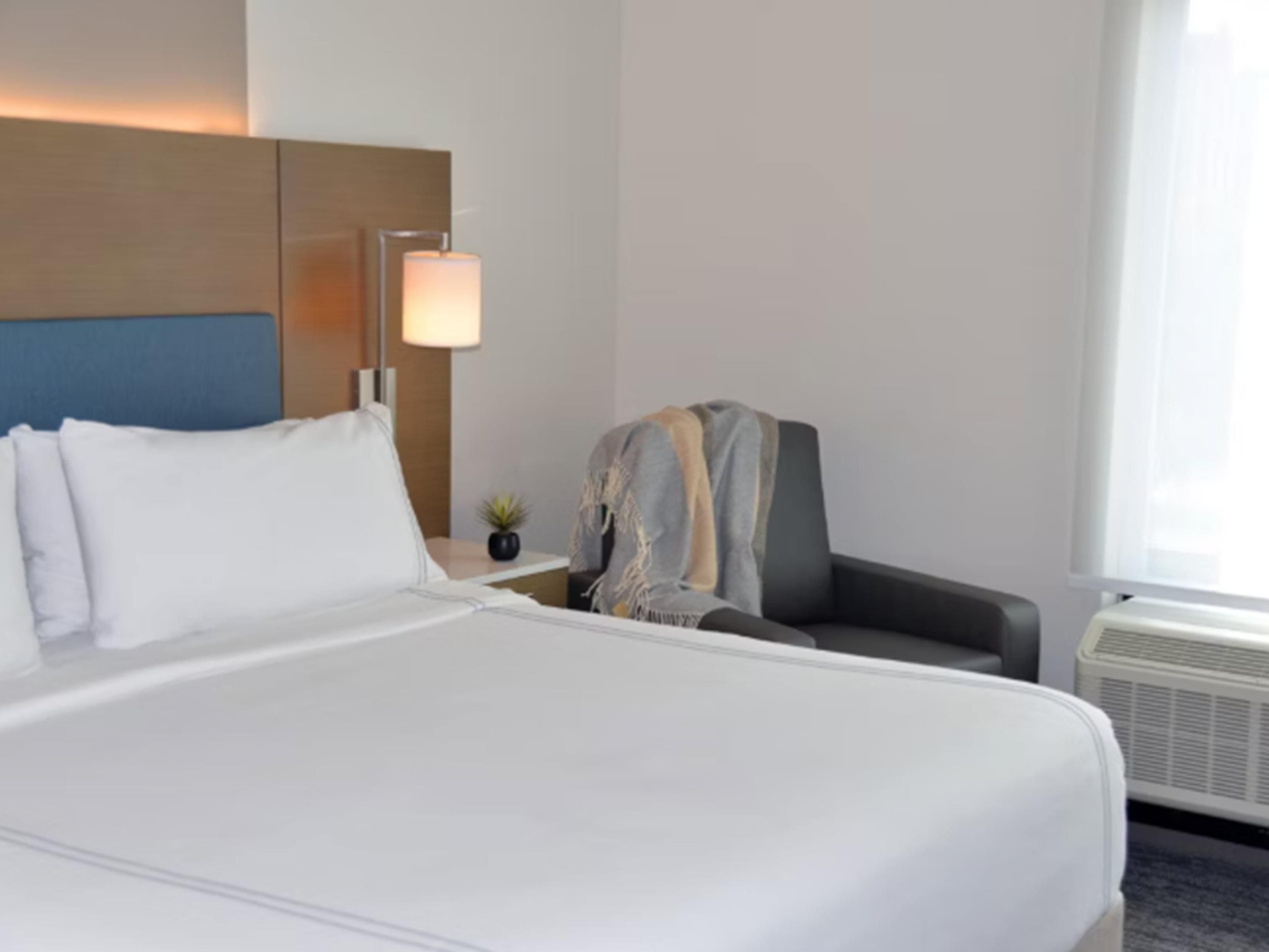 Find enhanced comfort in select rooms featuring a plush recliner. Sink into this dedicated relaxation zone to unwind, put your feet up, and recharge after a long day or important appointments. We focus on these comfortable touches to support your well-being during your stay in Rochester.