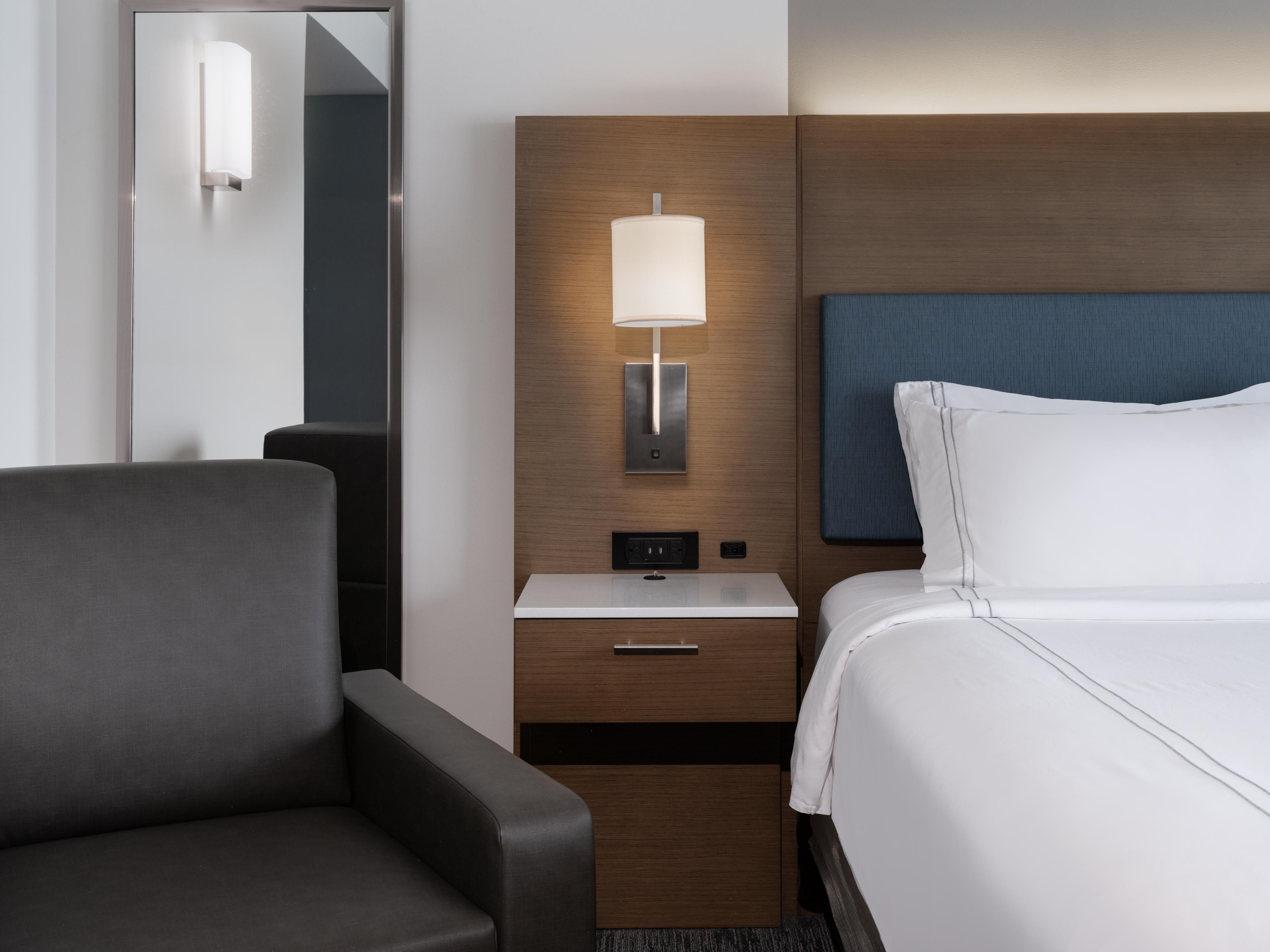 Bed with an in-room recliner