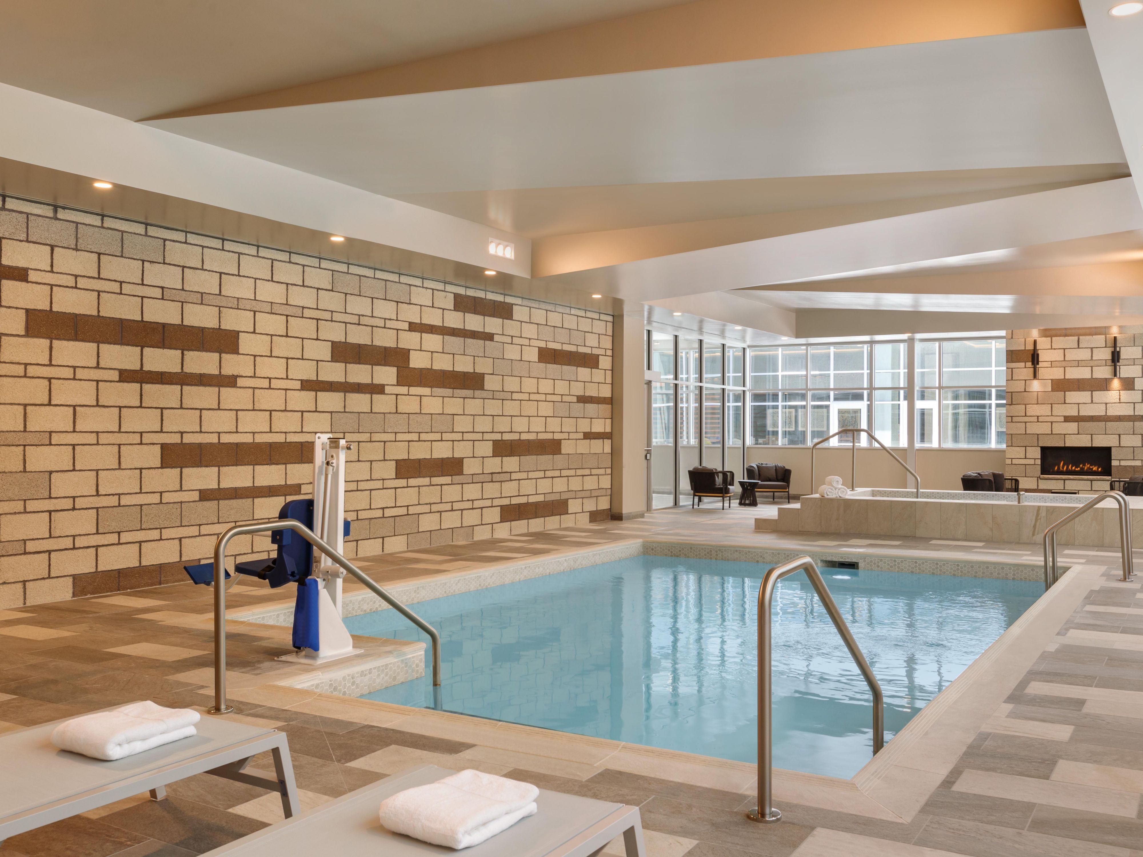 Indoor pool with lounge chairs