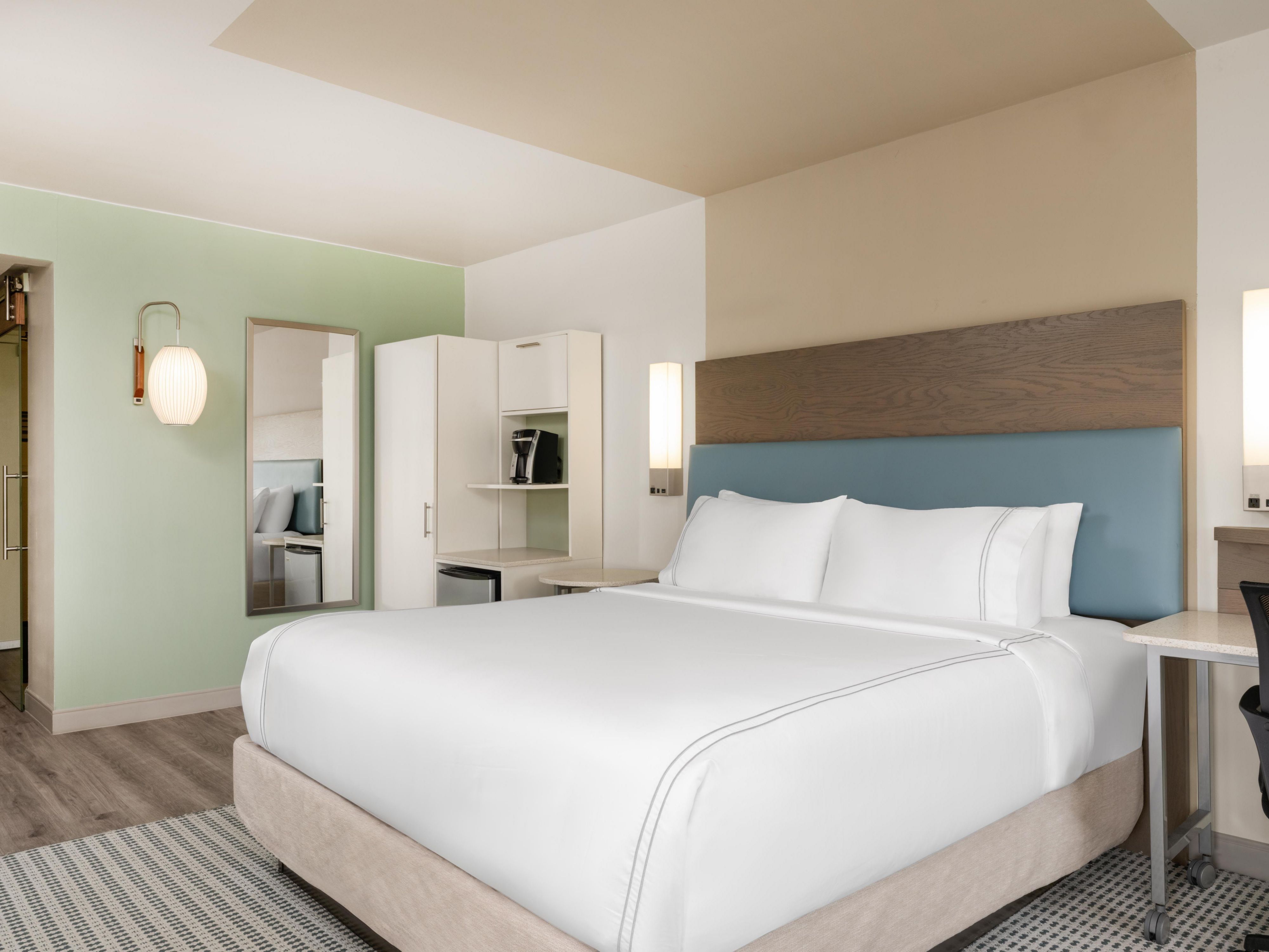 Spacious suite featuring a modern king bed