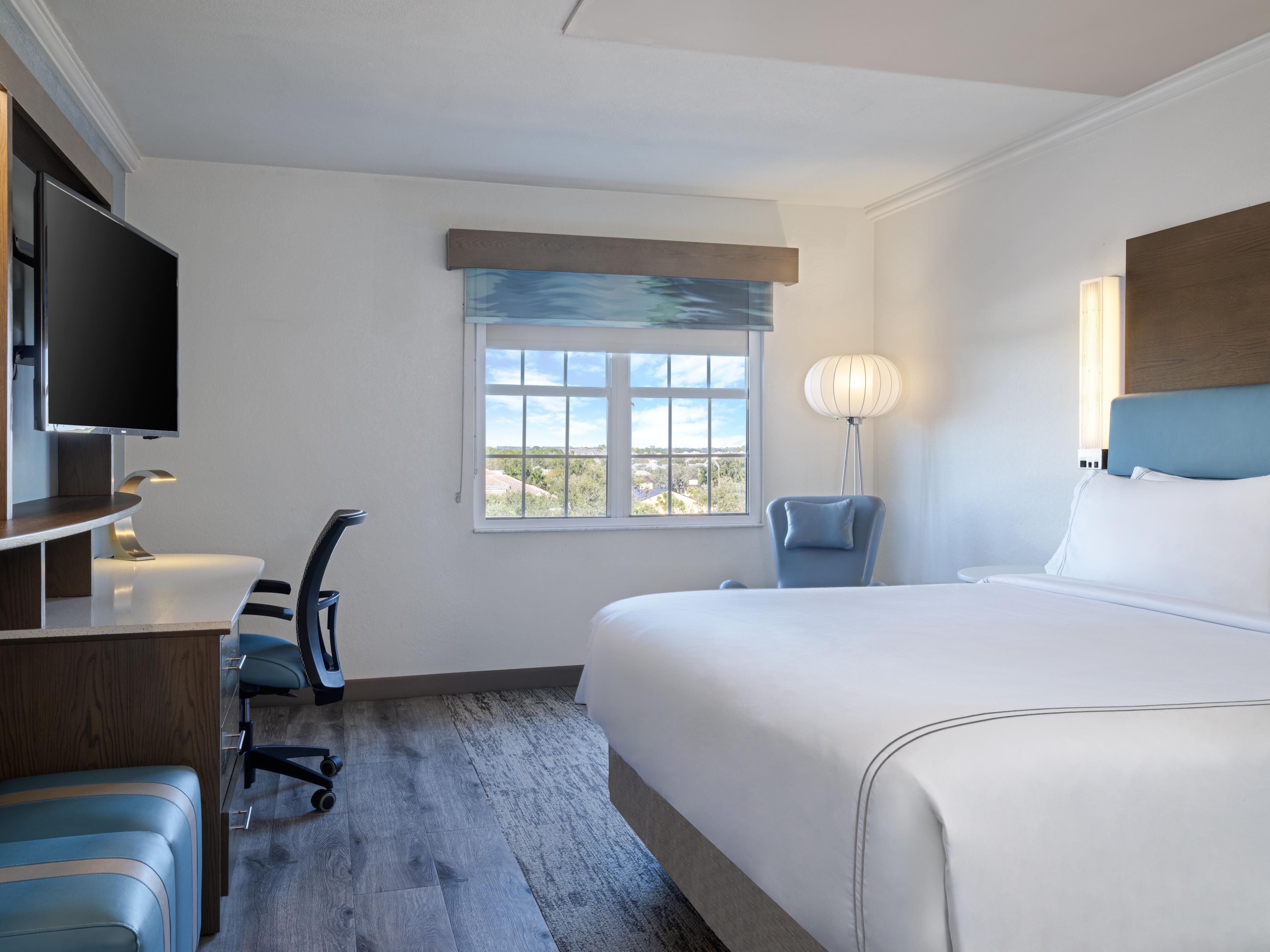 Inviting king room with modern décor and open space