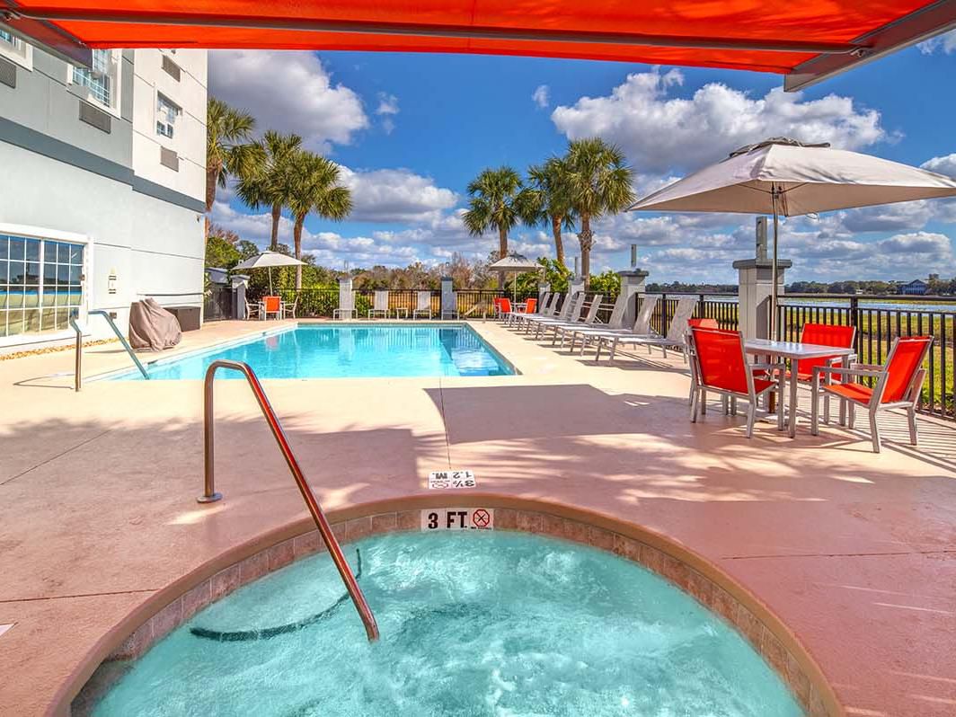 Outdoor pool with lounge chairs