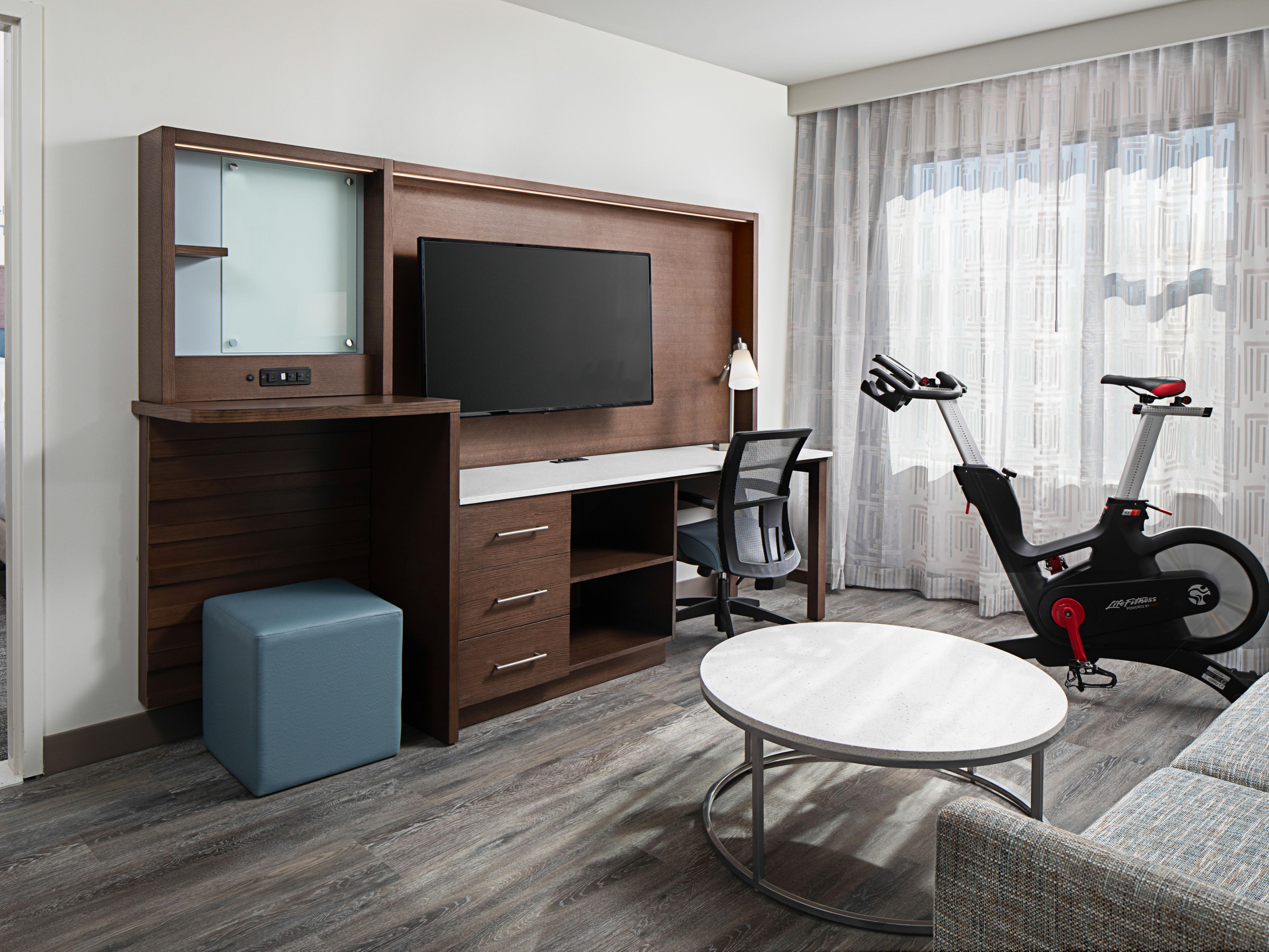Each room suite of the hotel is designed with health and fitness in mind.  All suites feature in-room exercise equipment including Peloton® bikes, as well as on-demand training videos, & LED mood lighting to enhance rest & productivity. Free high-speed Wi-Fi will keep you connected so you can get the most out of both work & play in all rooms.
