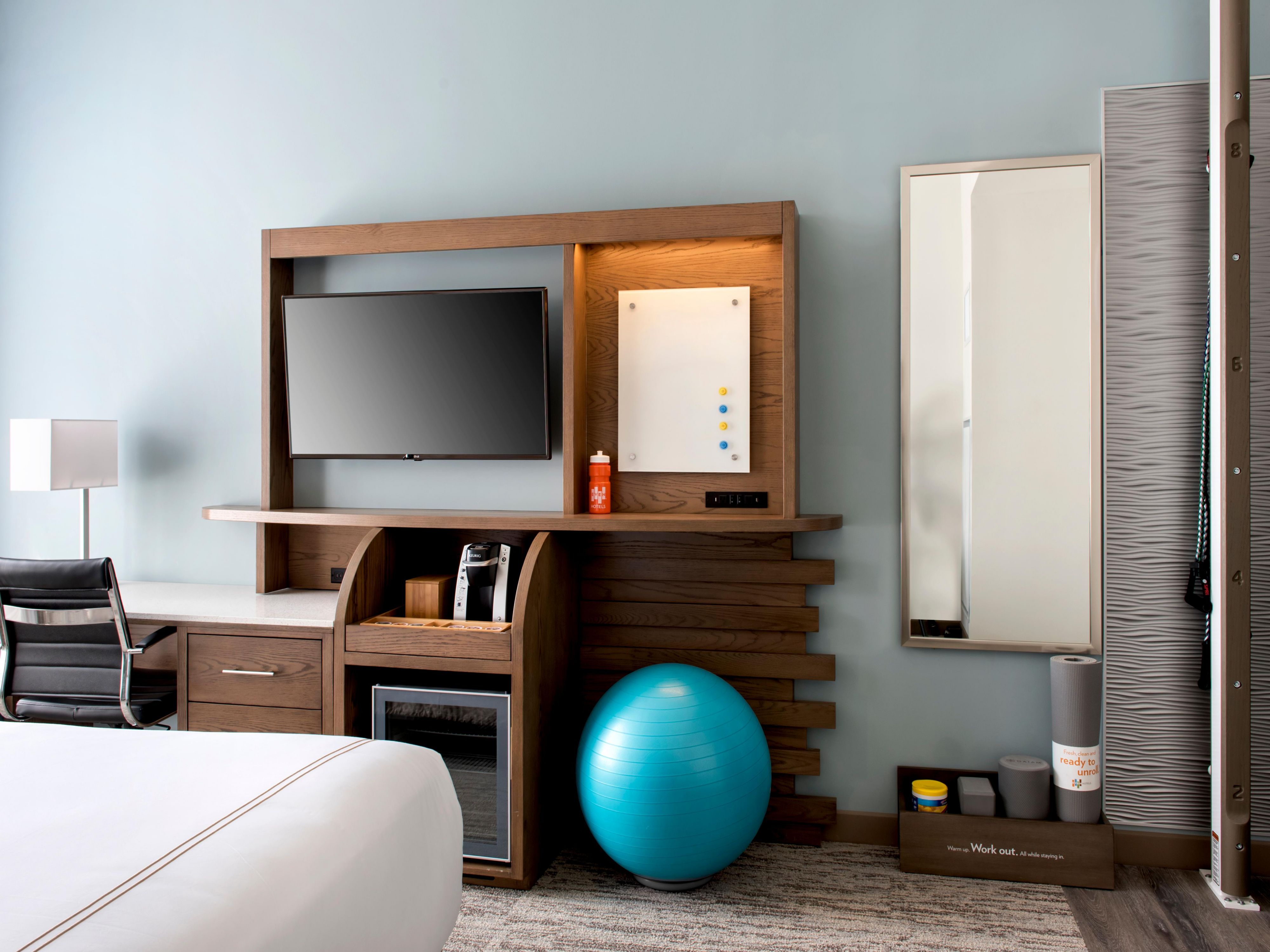 Each room suite of the hotel is designed with health and fitness in mind.  All suites feature in-room exercise equipment including Peloton® bikes, as well as on-demand training videos, & LED mood lighting to enhance rest & productivity. Free high-speed Wi-Fi will keep you connected so you can get the most out of both work & play in all rooms.
