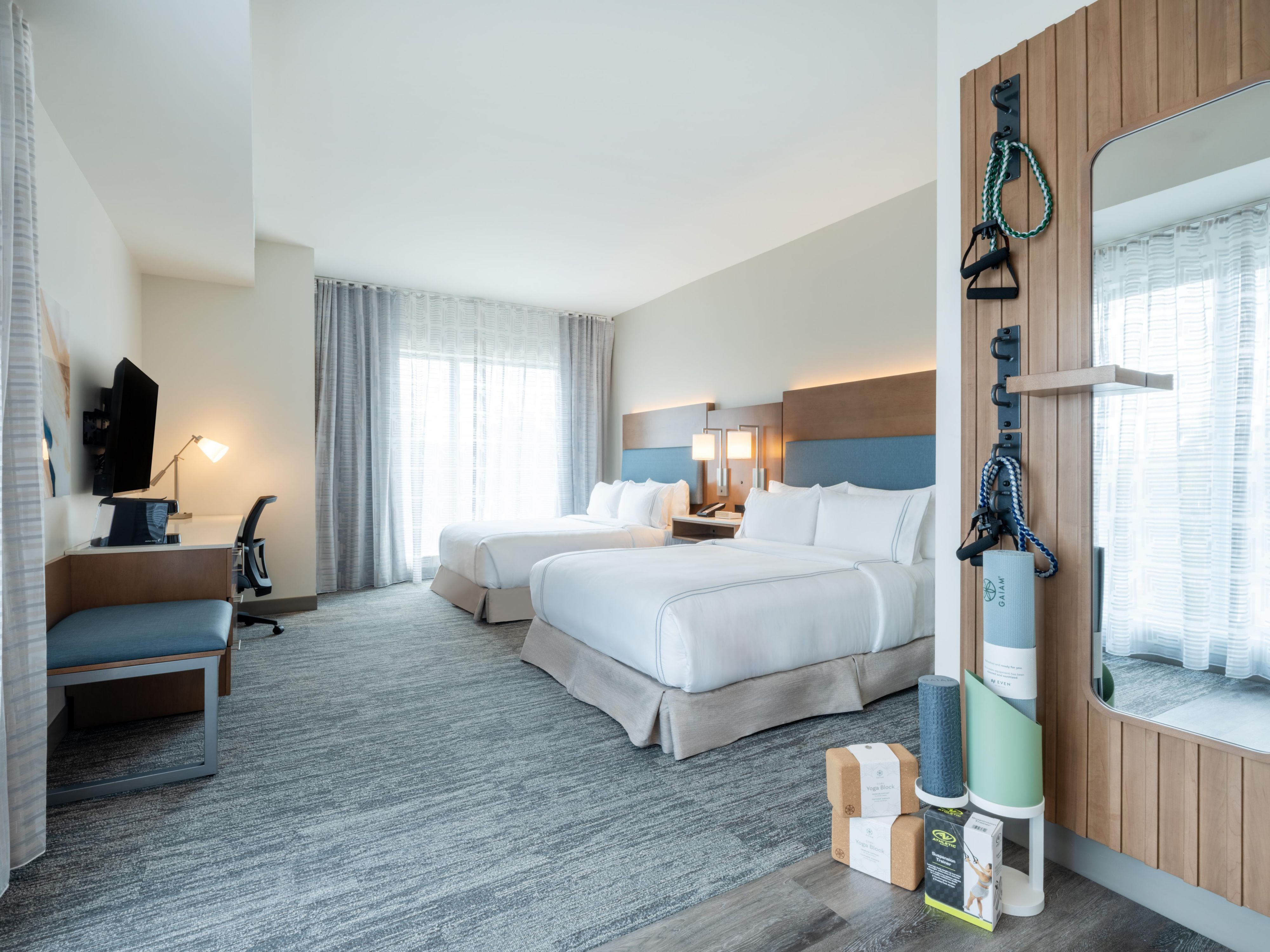 Miami wellness awaits. Your in-room haven offers a workout zone, on-demand fitness videos, mini fridge & workspace. Relax in the spa-like bath & unwind with blackout shades & plush linens. Free Wi-Fi keeps you connected.