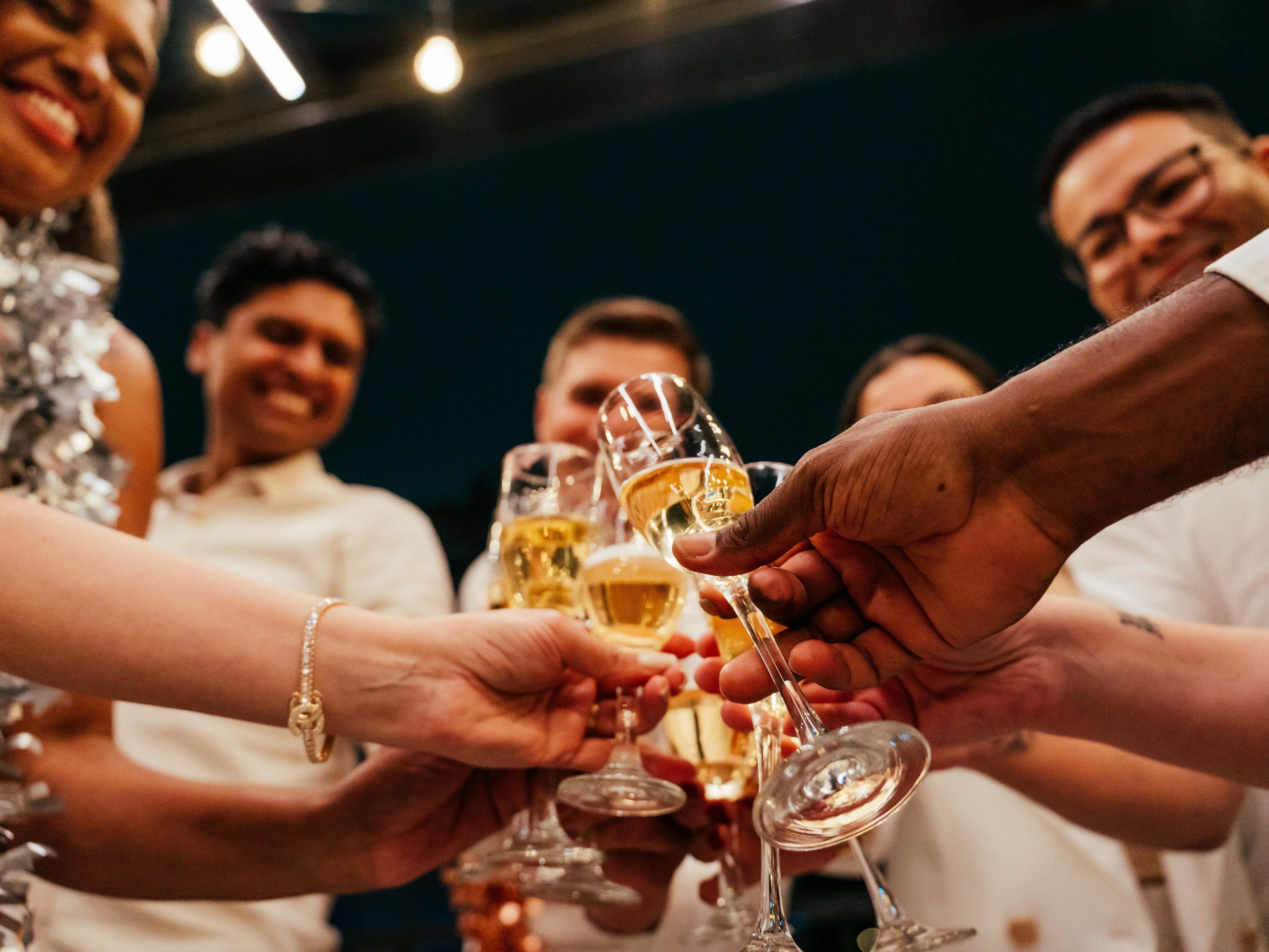 Friends toasting with wine.