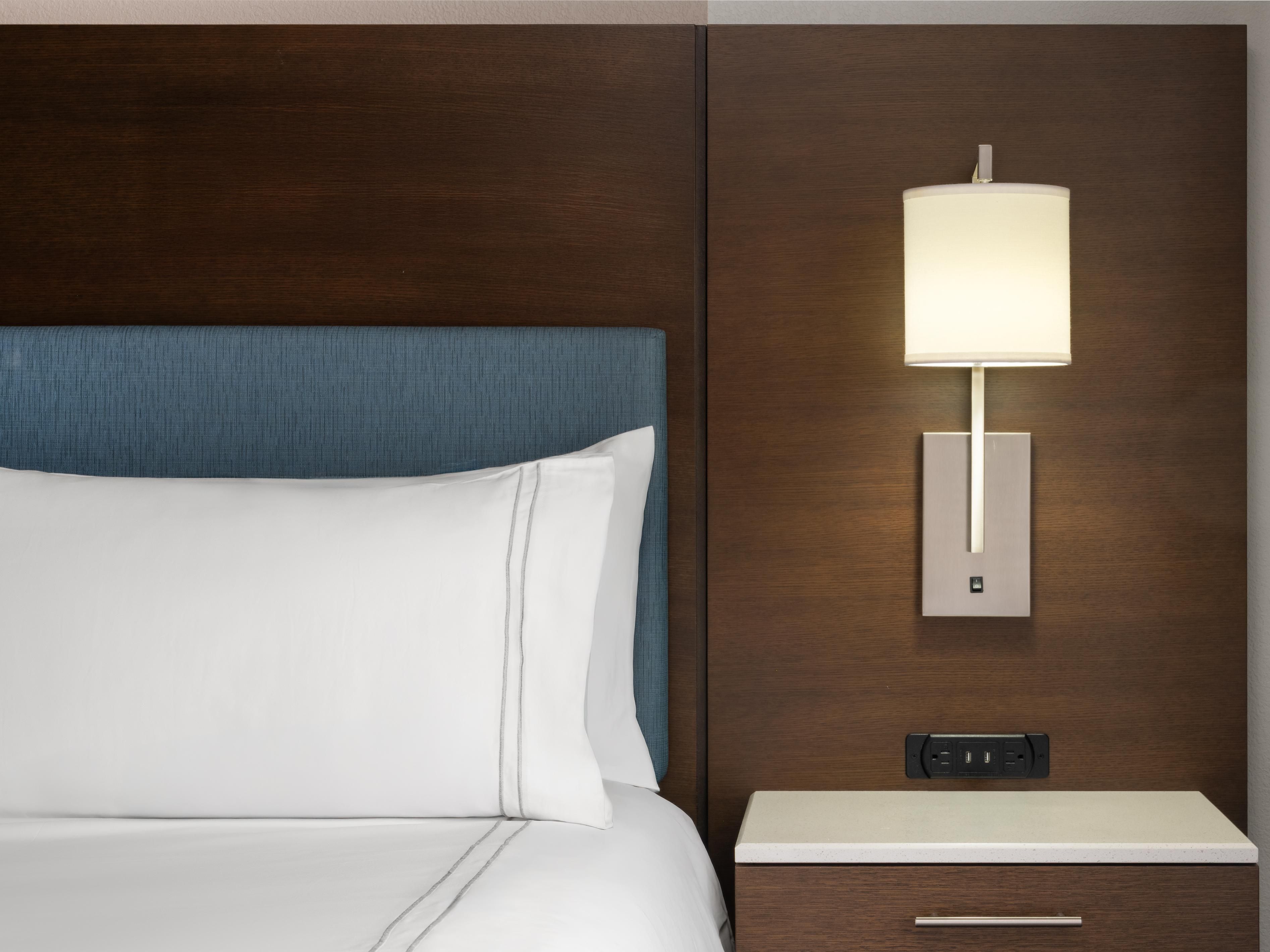 Double beds divided by a nightstand