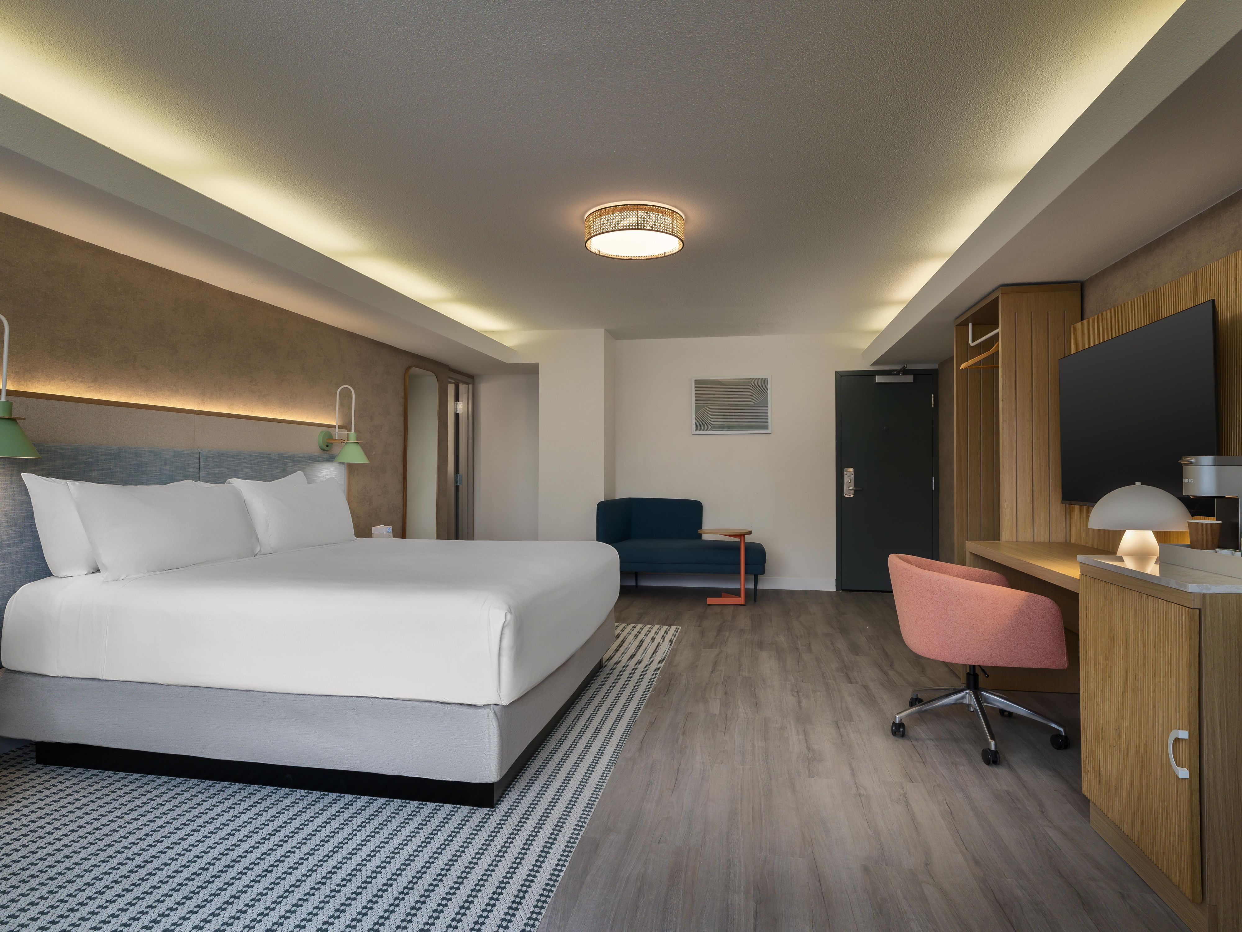 Guest room with king bed and peloton bike