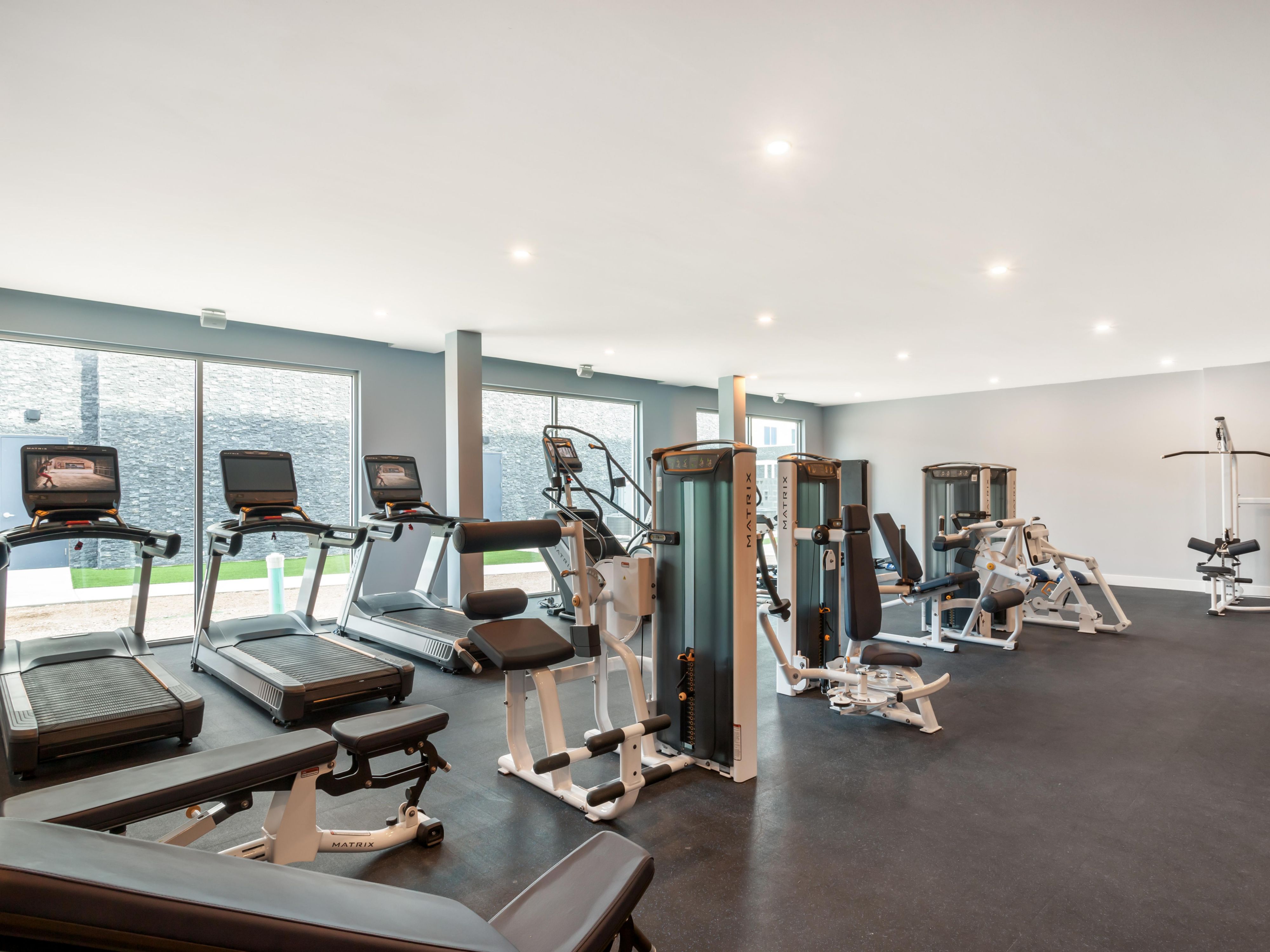 Our spacious state-of-the-art fitness center provides 24-hour access to top-of-the-line cardio and strengthening equipment. Maintain your fitness routine with ease, ensuring 'round-the-clock empowerment for your overall wellness. Likewise, every guestroom features an in-room training zone for your added convenience. 