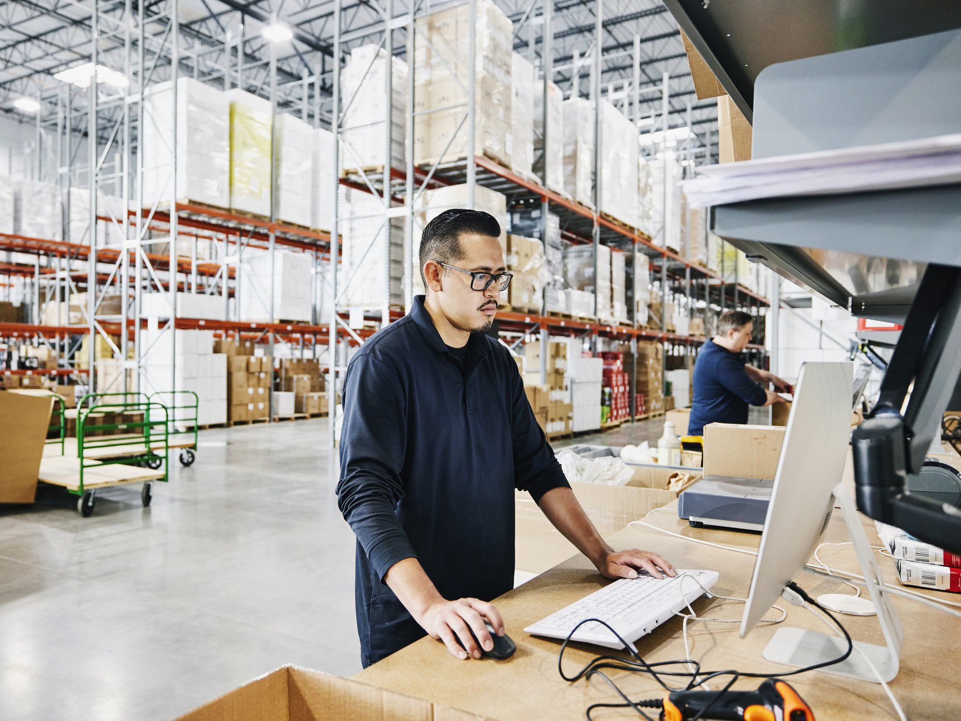 Warehouse worker taking inventory