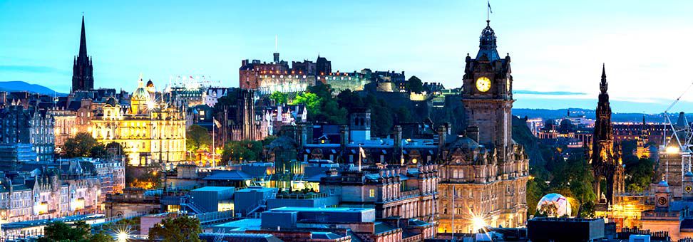Edinburgh cityscape city lights at dusk