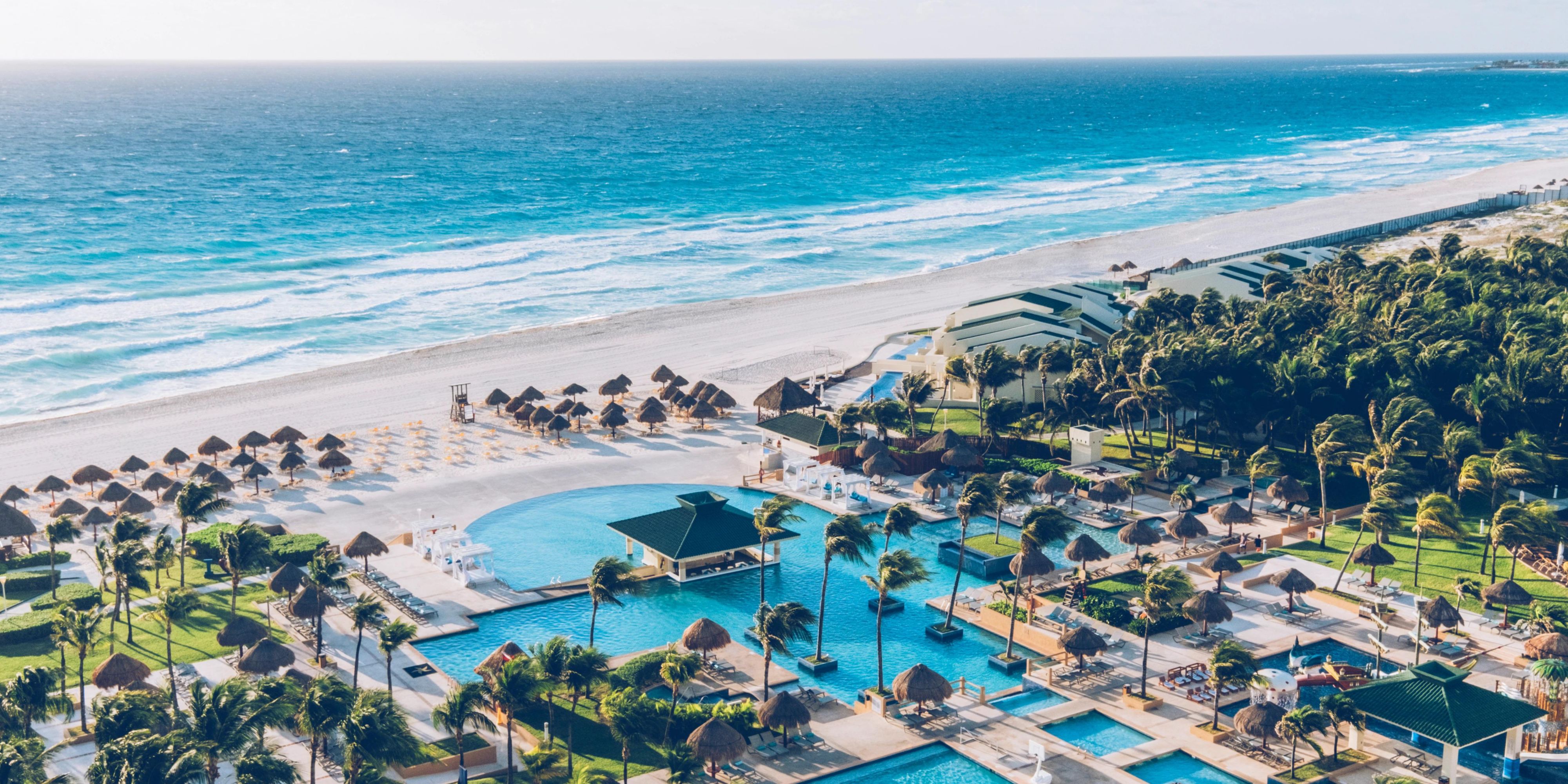 Overhead view of resort pool area and beach