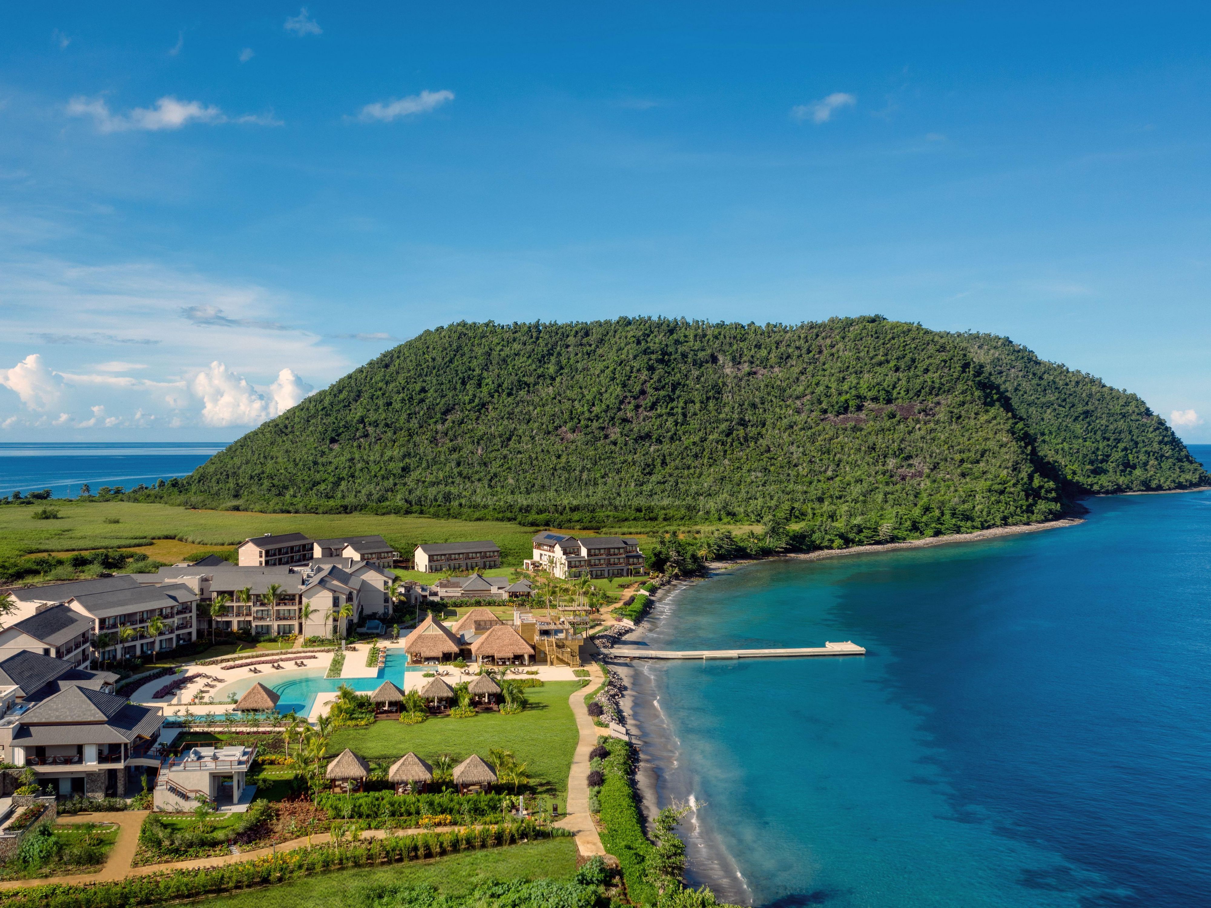 Aerial view of Island Resort, Beach and Mountainside