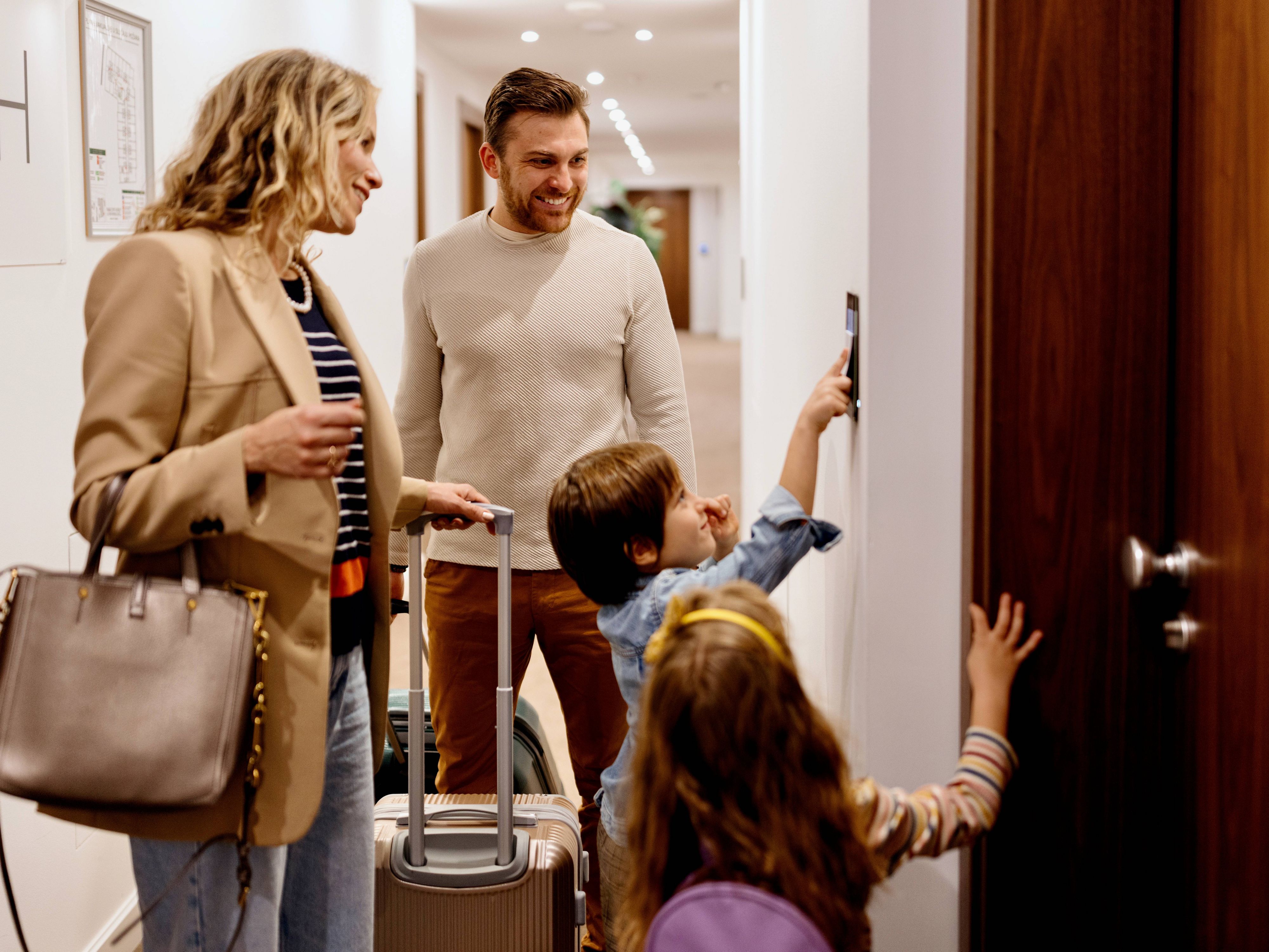Family checking into hotel