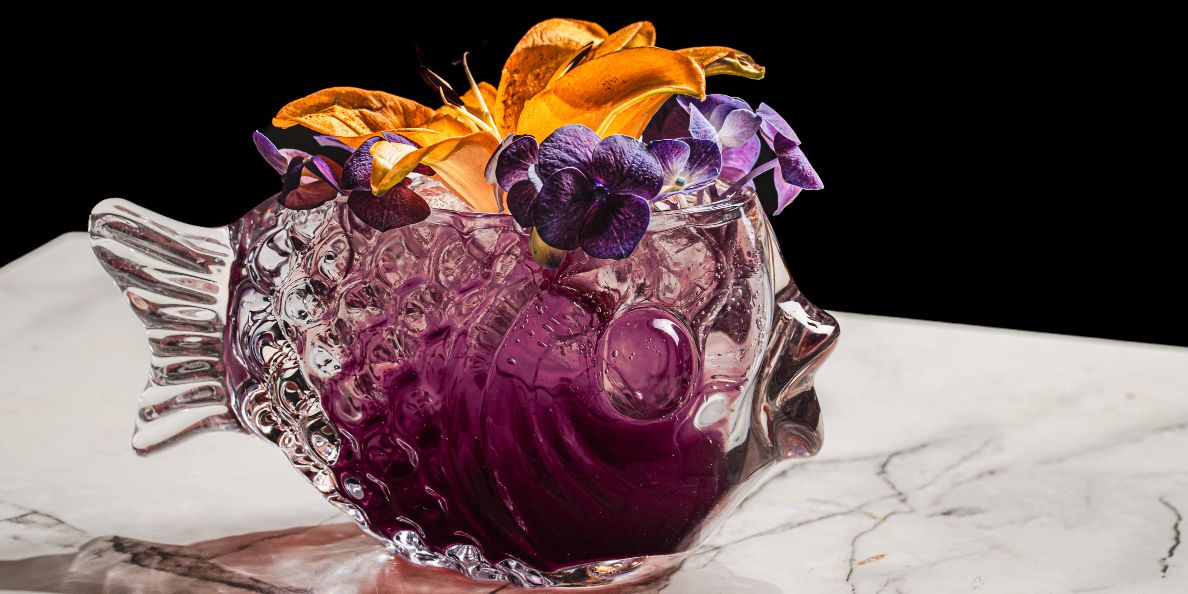 Cocktail in glass that resembles a fish