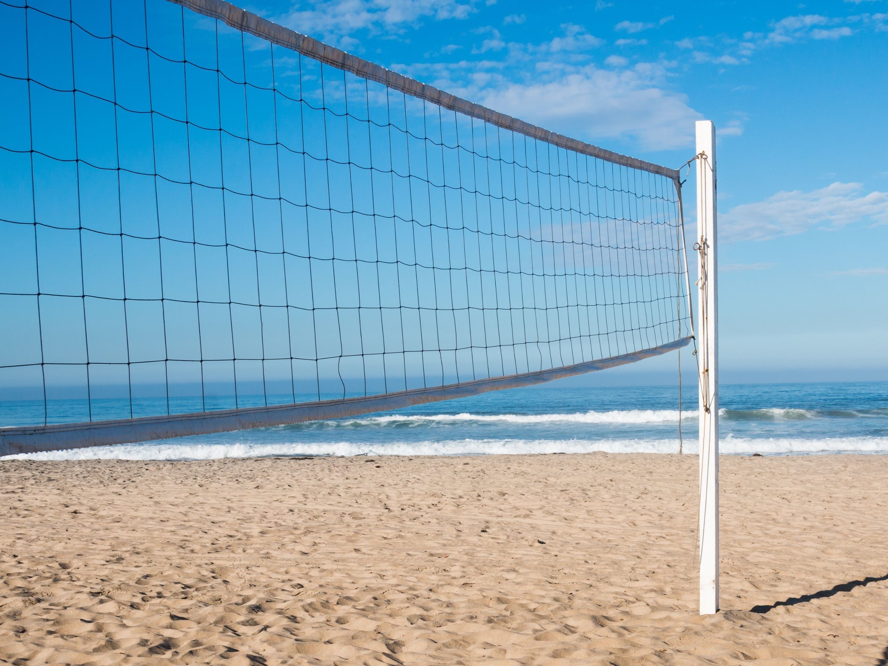 Beach volleyball court with net view