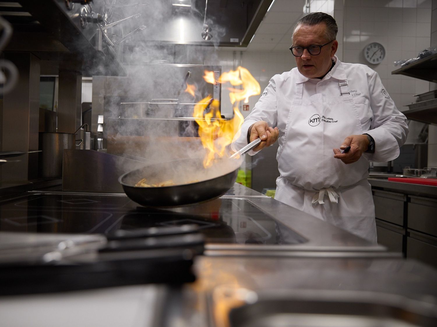 chefs working in a kitchen