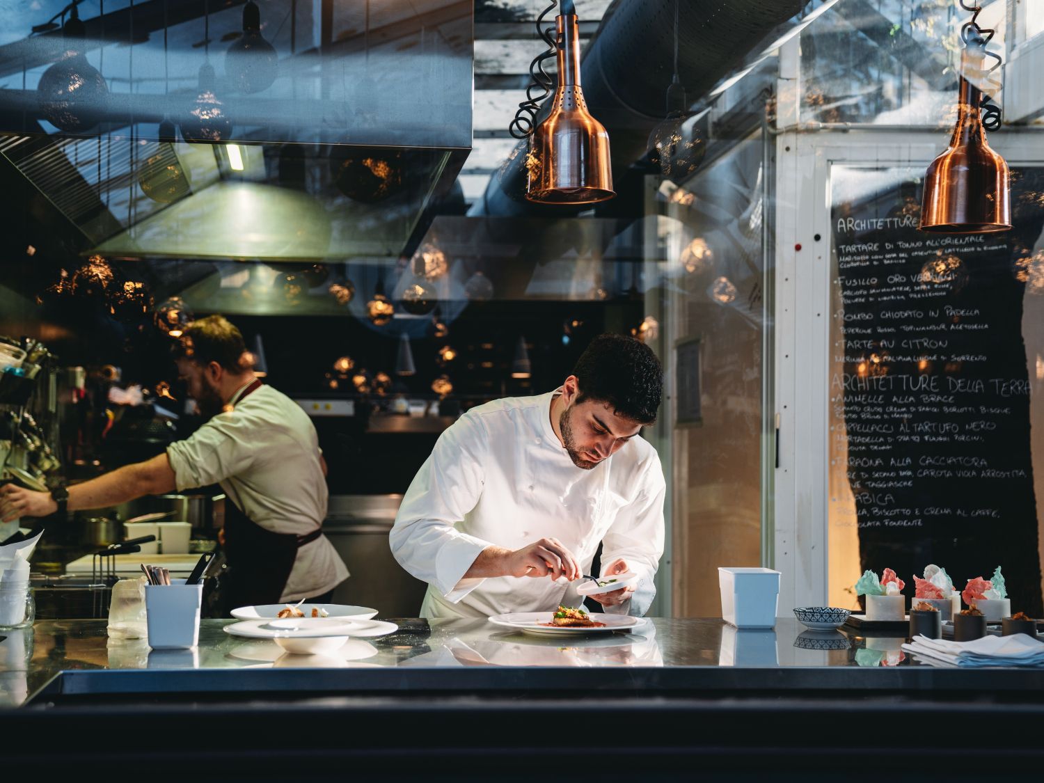 chefs working in a kitchen