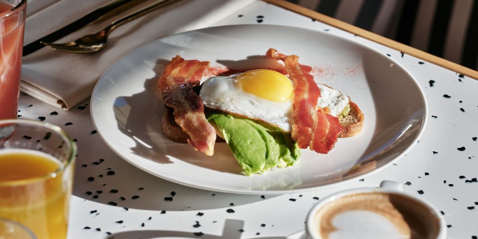 full english breakfast plate with fried egg