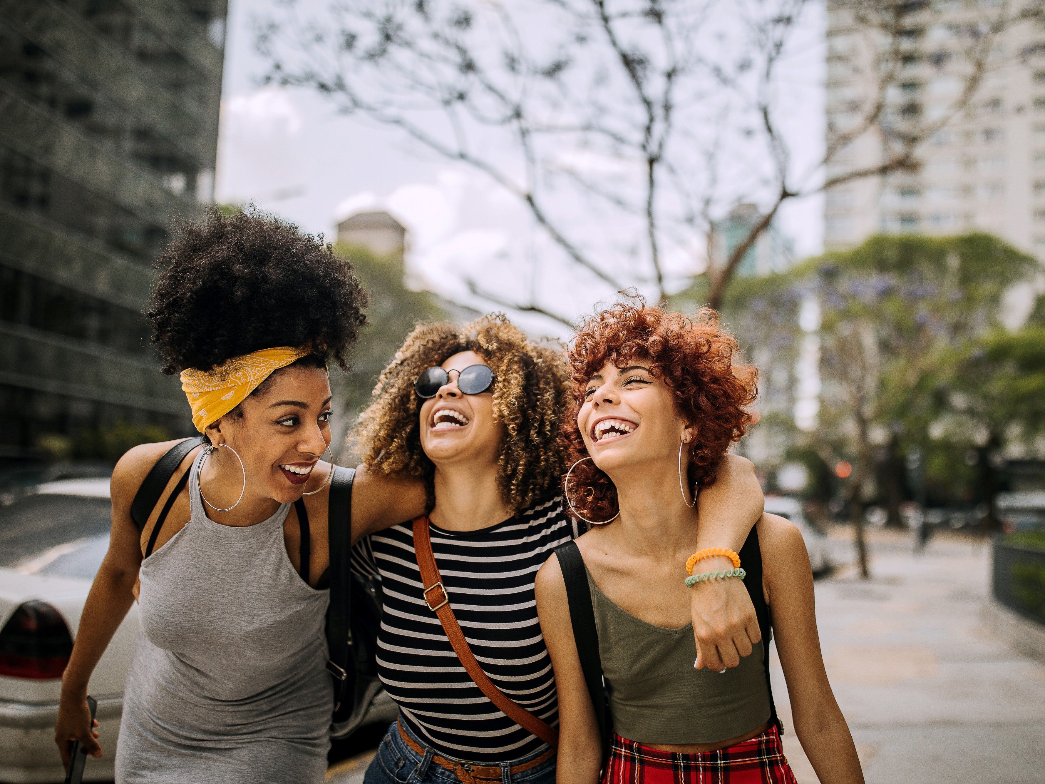Friends walking through the city