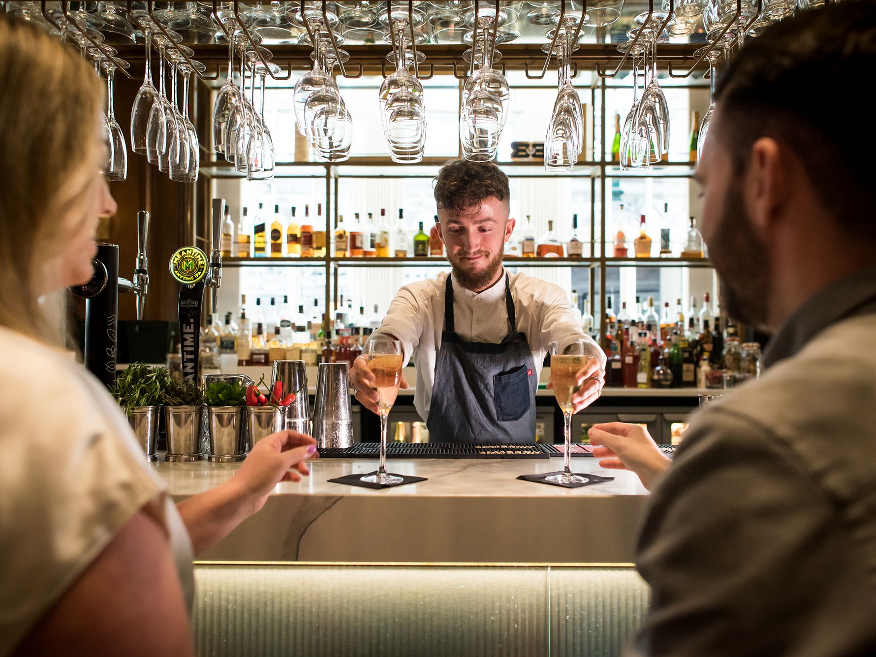 Bartender serving drinks