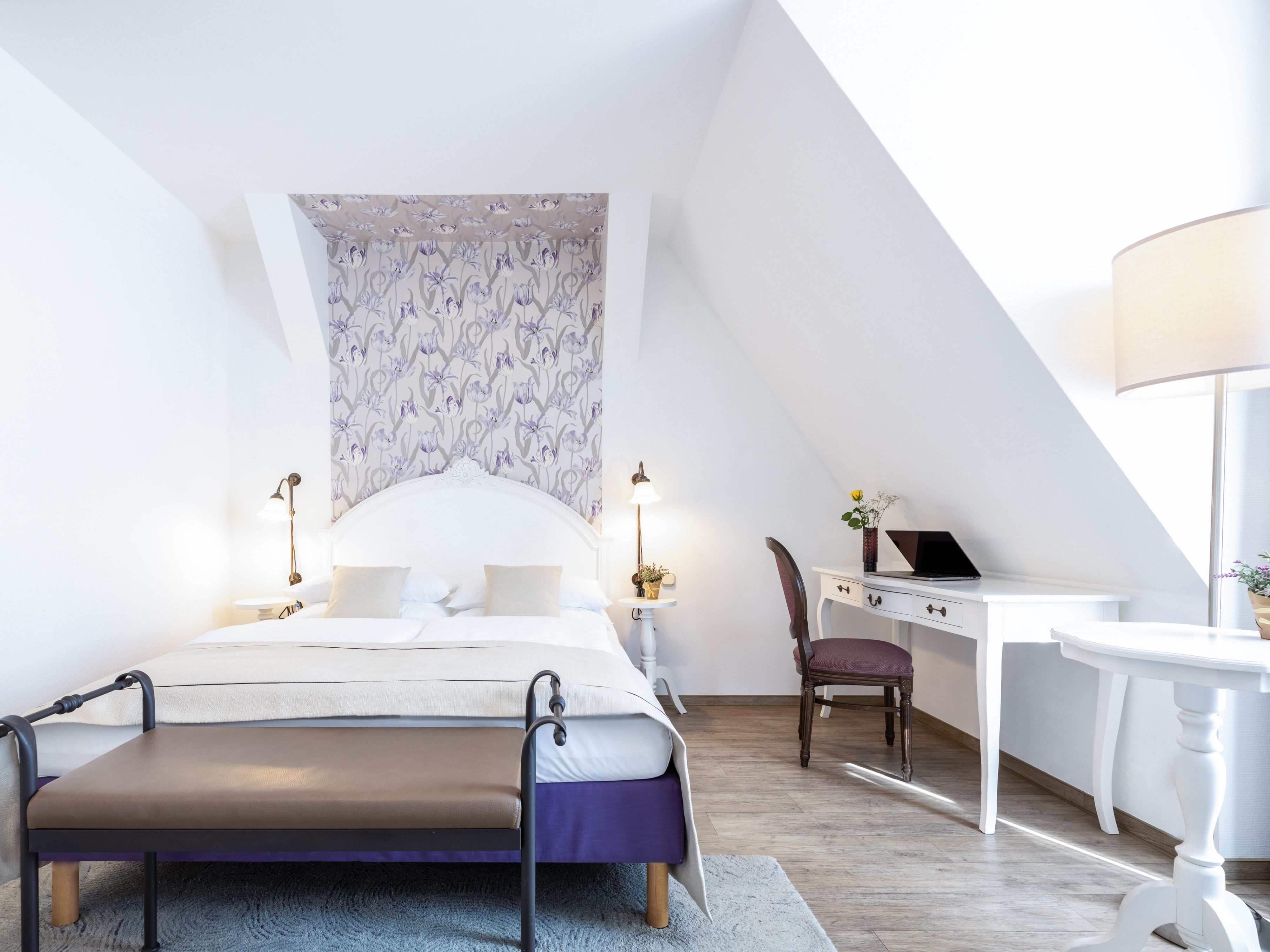 A charming room designed for romantic moments and restful nights
