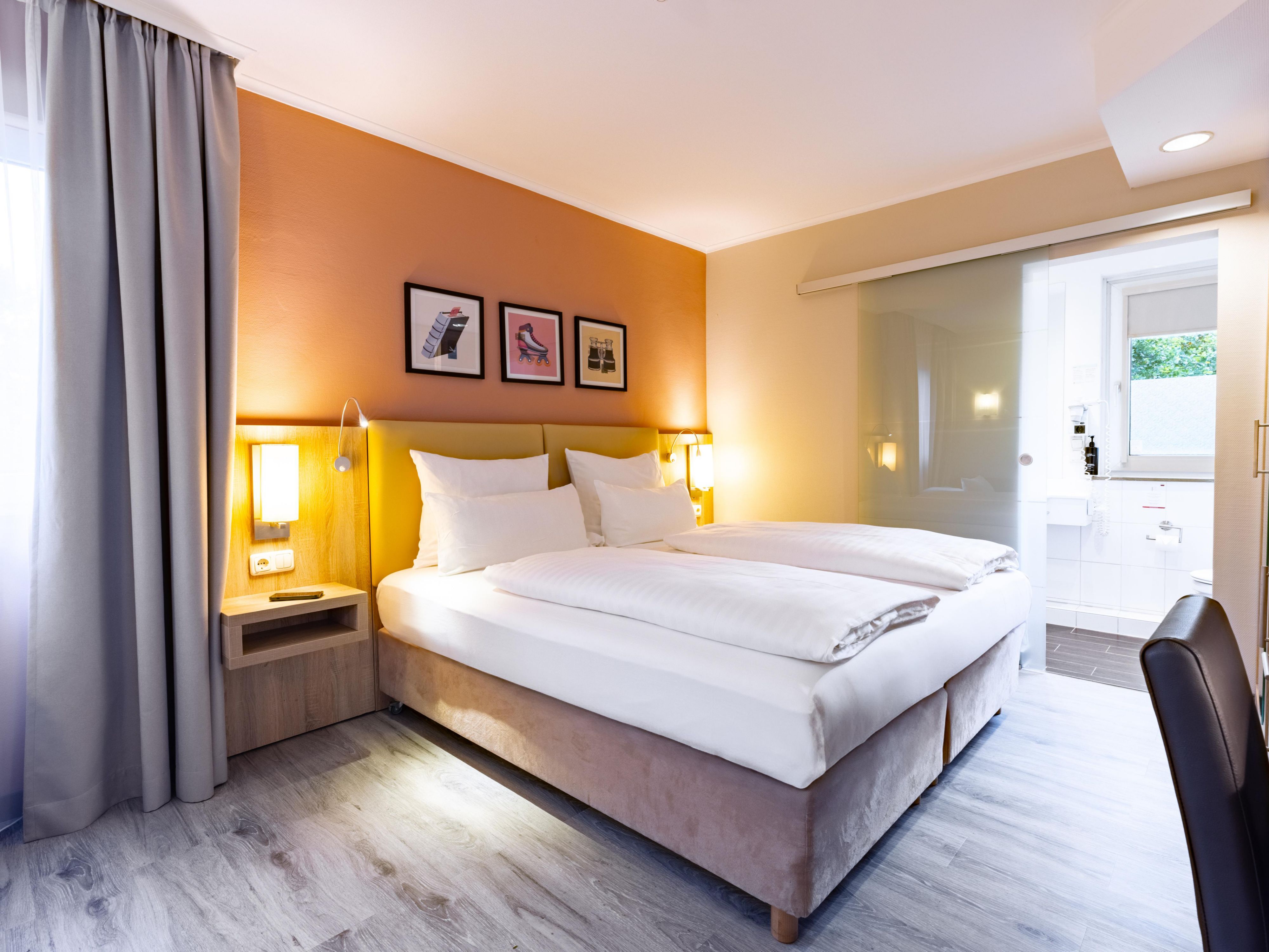 Room with 2 single beds and sofa bed for up to 3 people