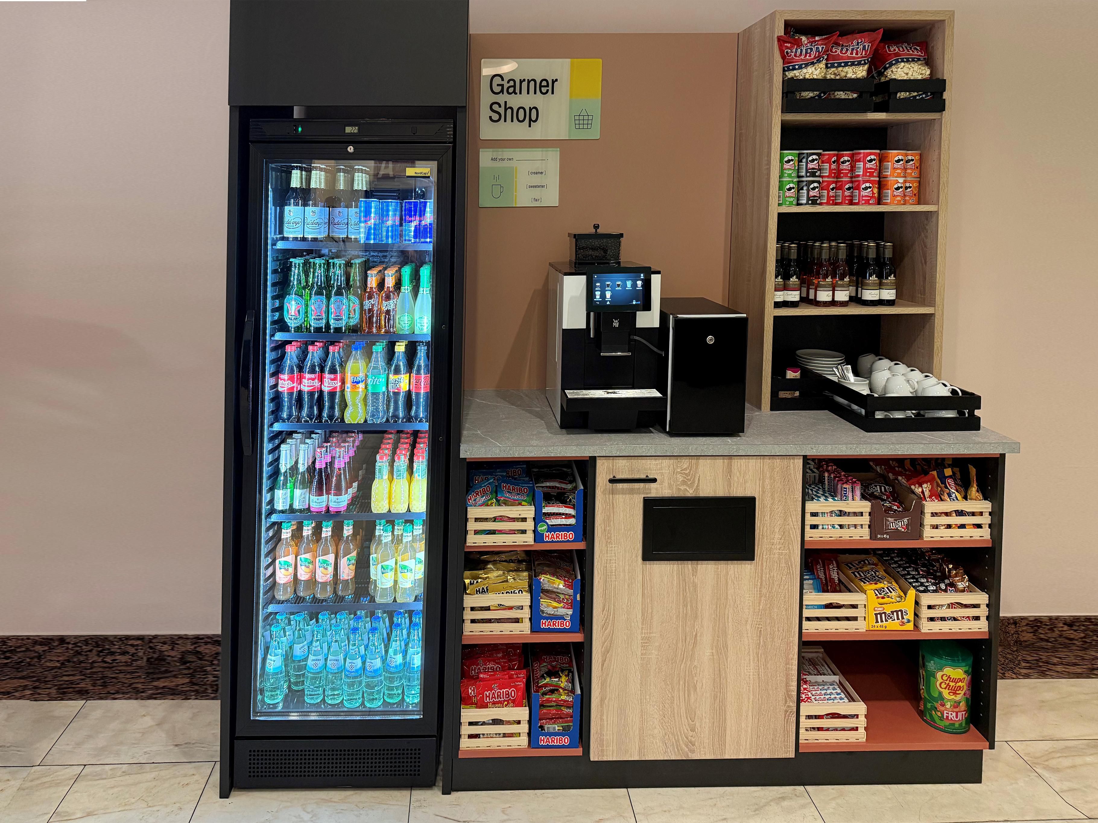 Whether you’re after an early bite or a late treat, our shop is always stocked and ready. Grab a fizzy drink, a little indulgence, or even a bottle for the evening. Available 24 hours a day. Choose your favourite and pay at reception.