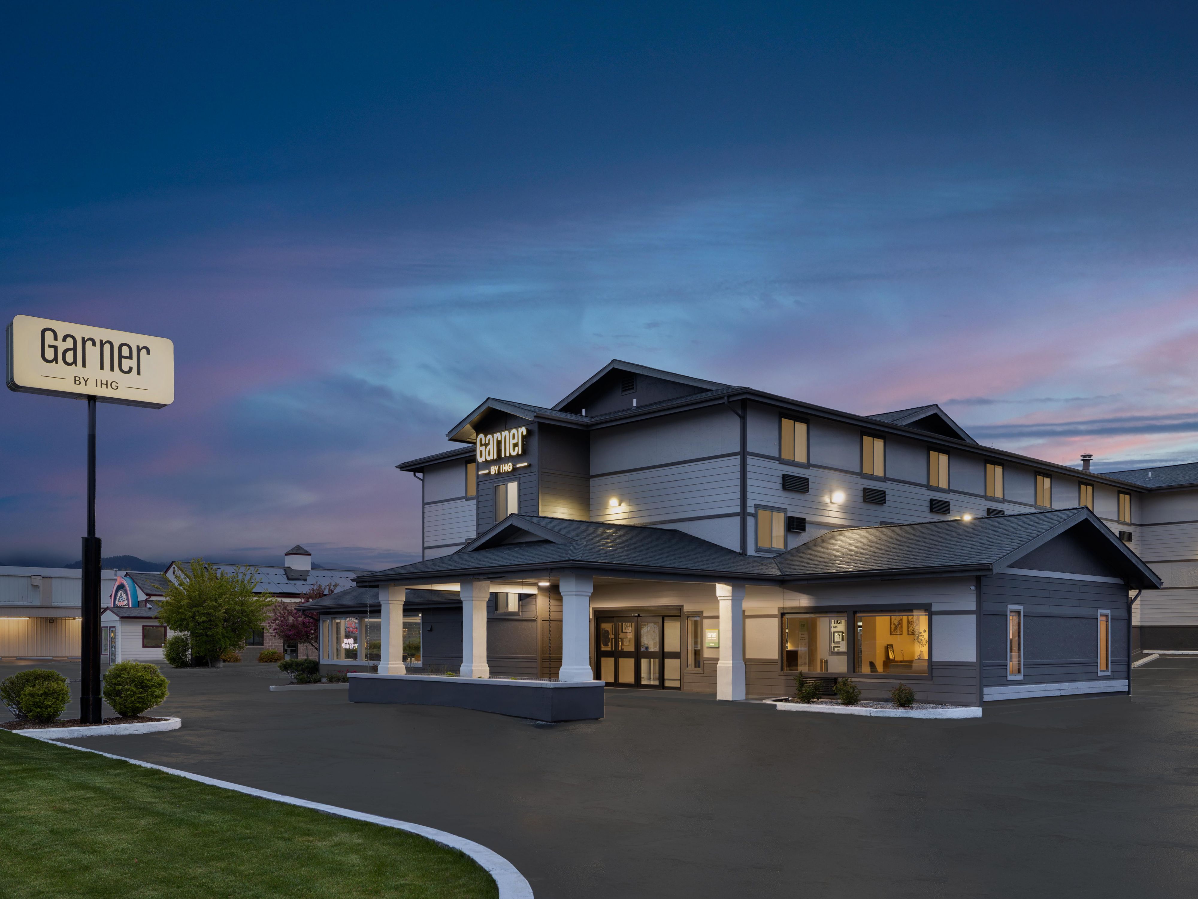 Exterior view of hotel at dusk