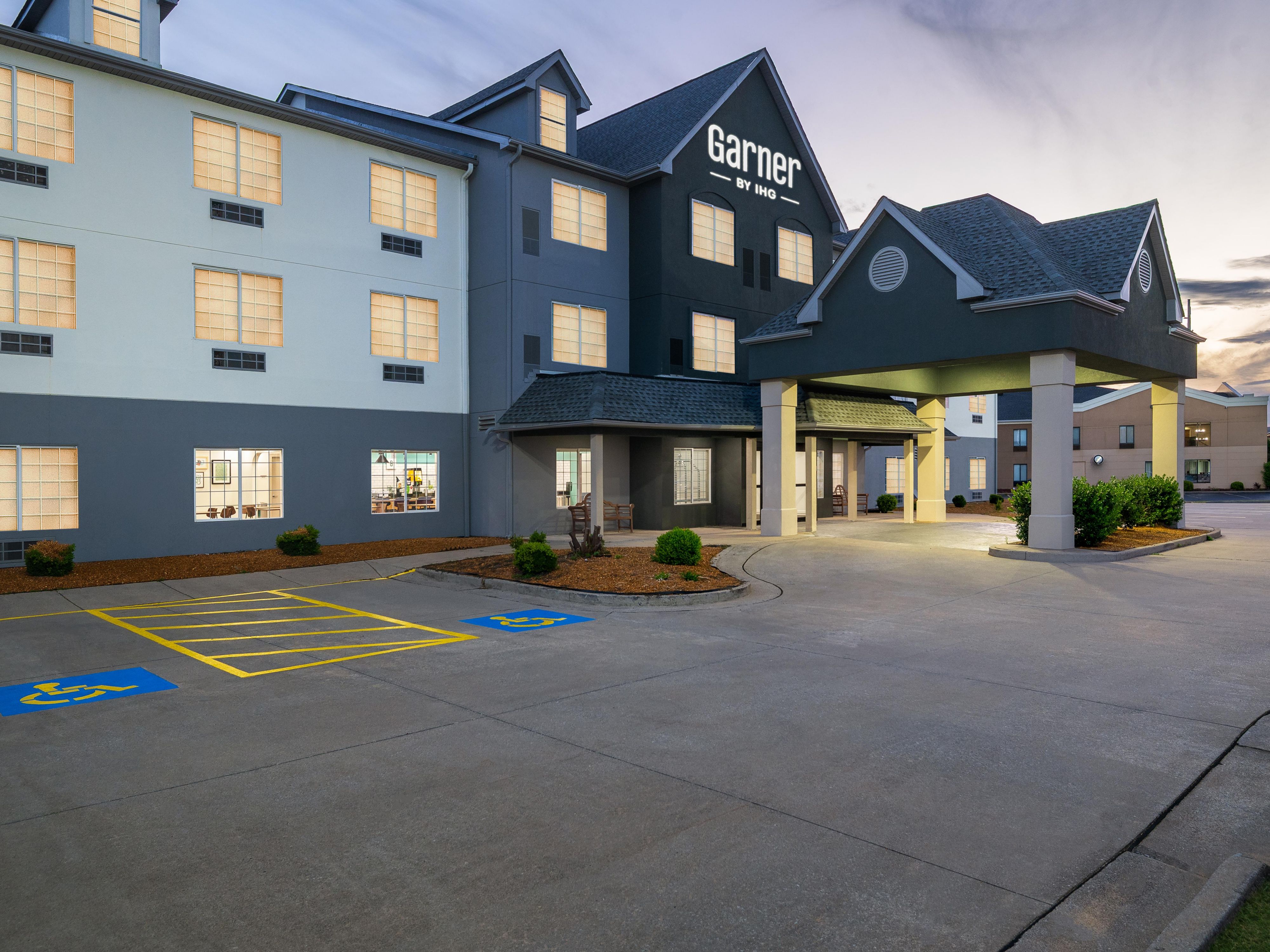 Exterior view of hotel at dusk