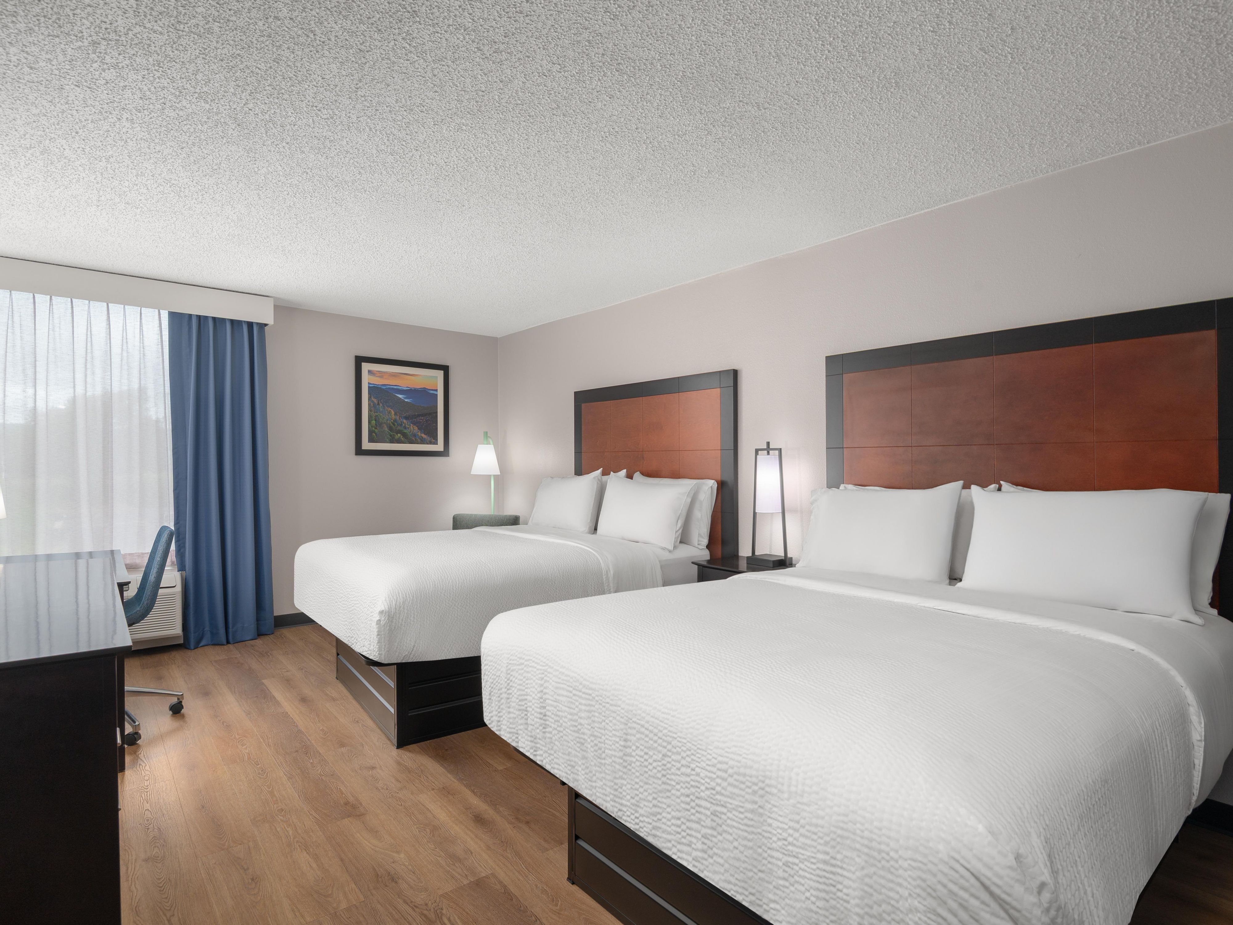 Enjoy restful nights in our cozy guest room with queen beds.