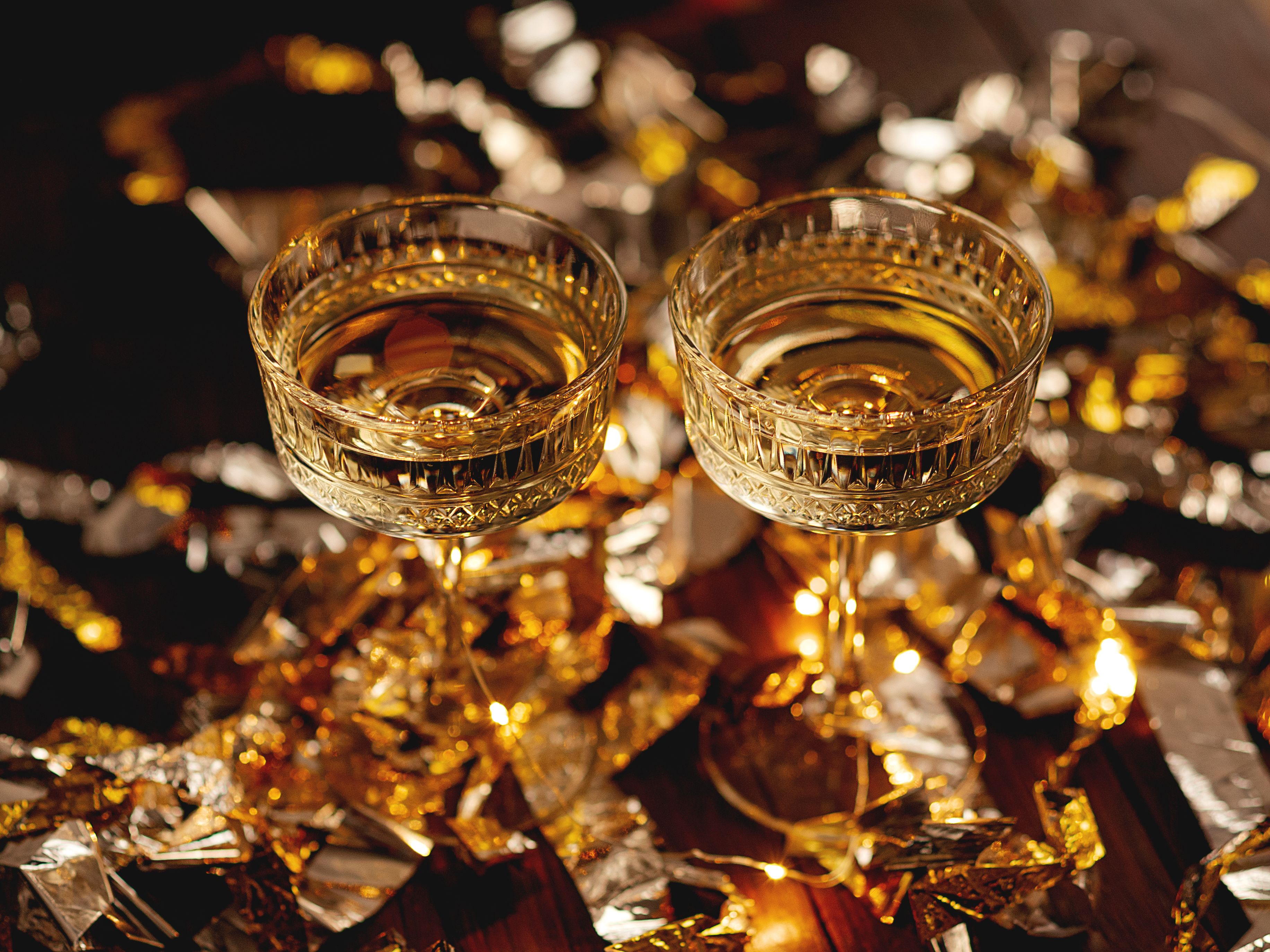 champagne glasses and confetti