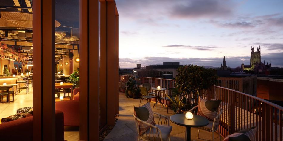 terrace outside seating area with views of the city