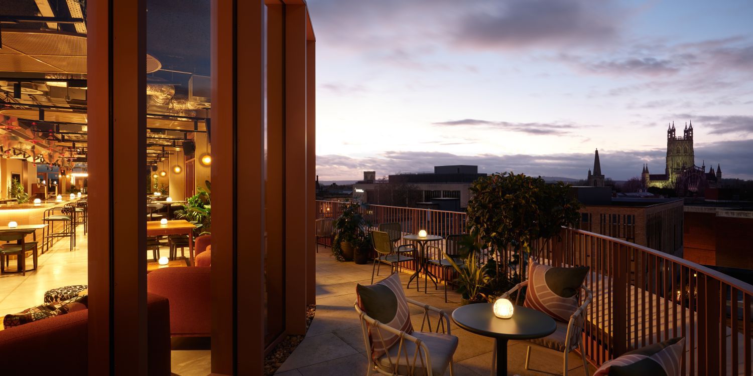 terrace outside seating area with views of the city