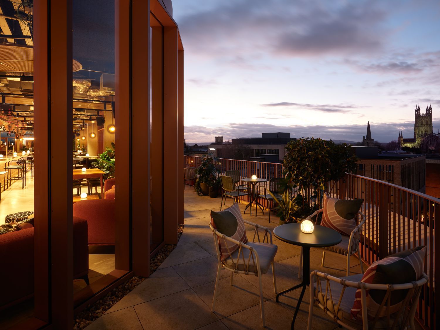 terrace seating area with views of the city