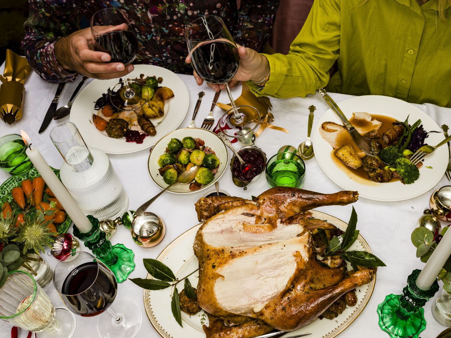Christmas feast, various dishes spread across the table including turkey