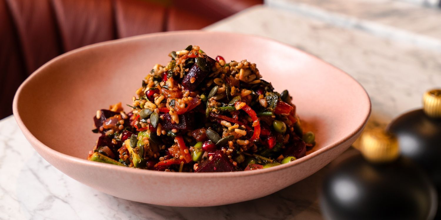 healthy colourful dish in a pink bowl
