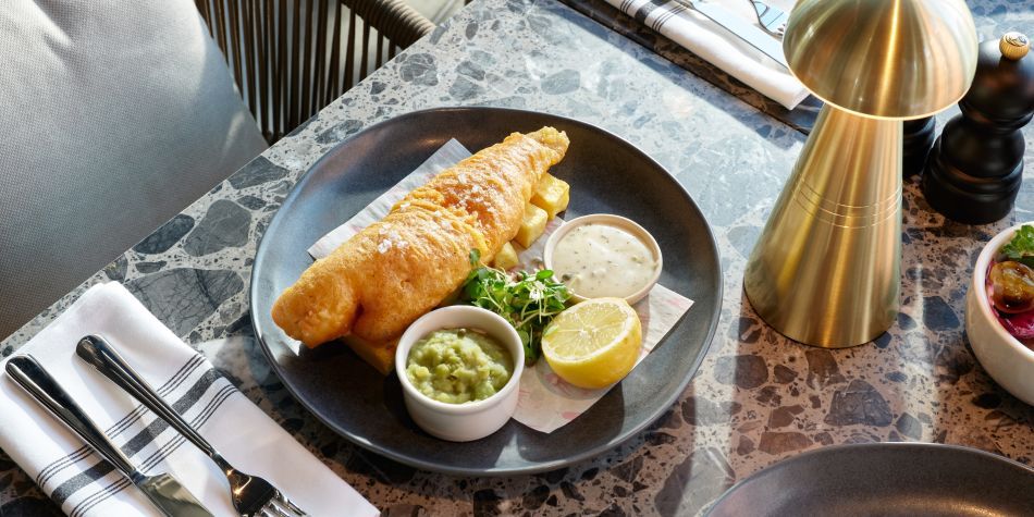 fish and chips and mushy peas as a main plate