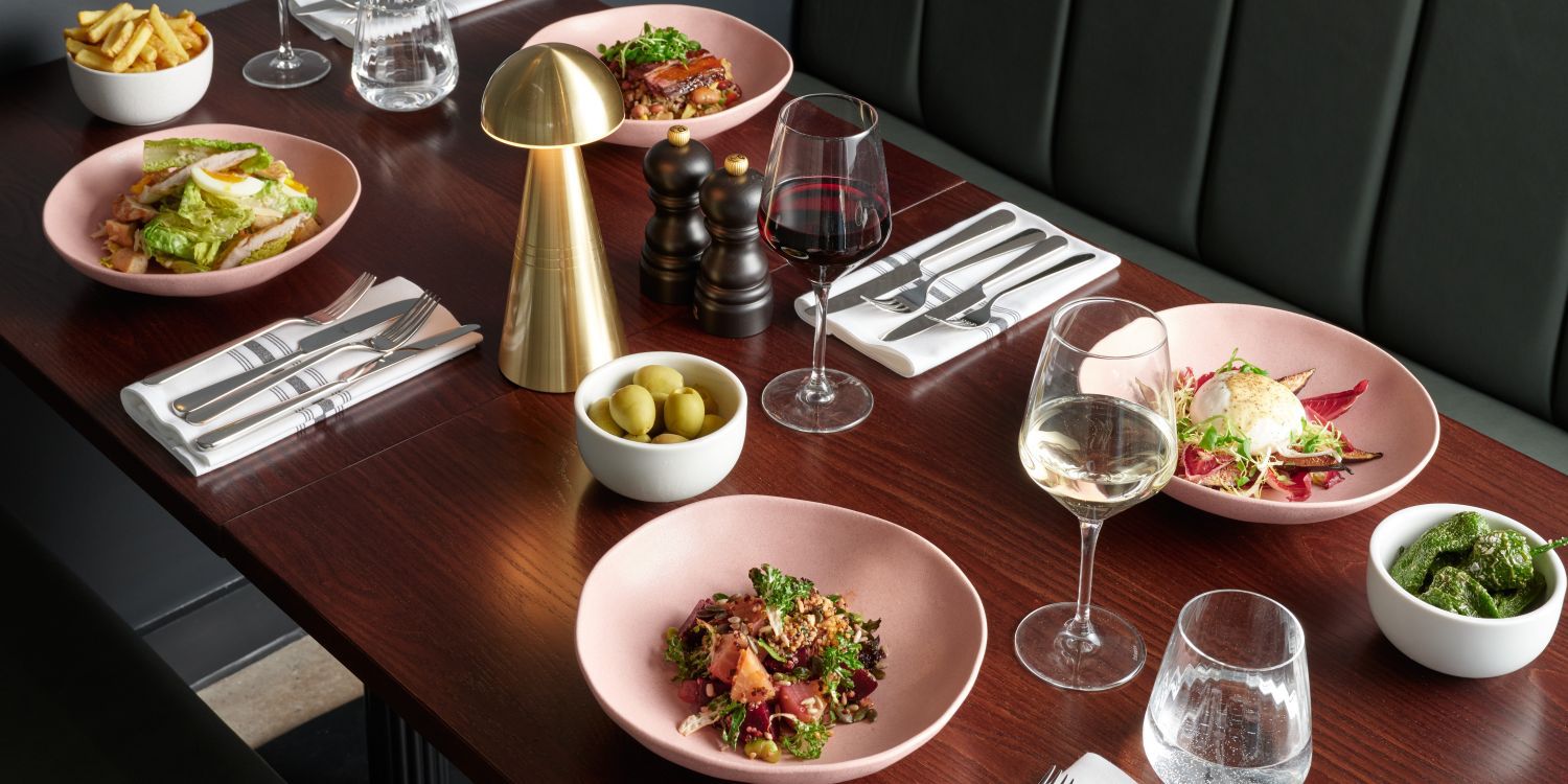 table of varied dishes and drinks