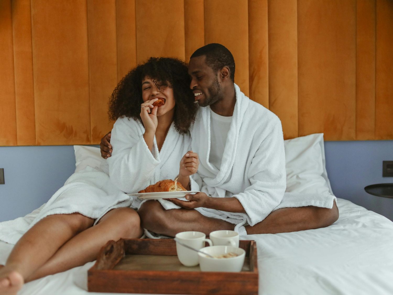king size bedroom, couple enjoying breakfast
